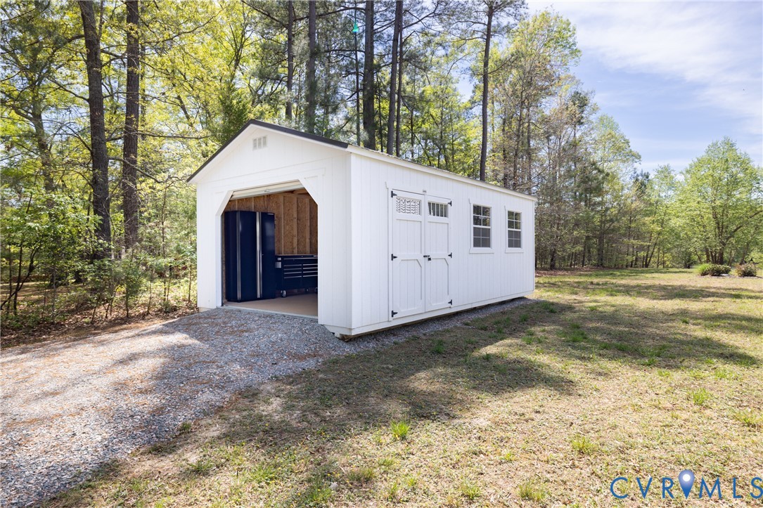 15618 Rowlett Road Chesterfield, VA 23838 - Photo 28 of 29 a view of a house with a yard and large tree