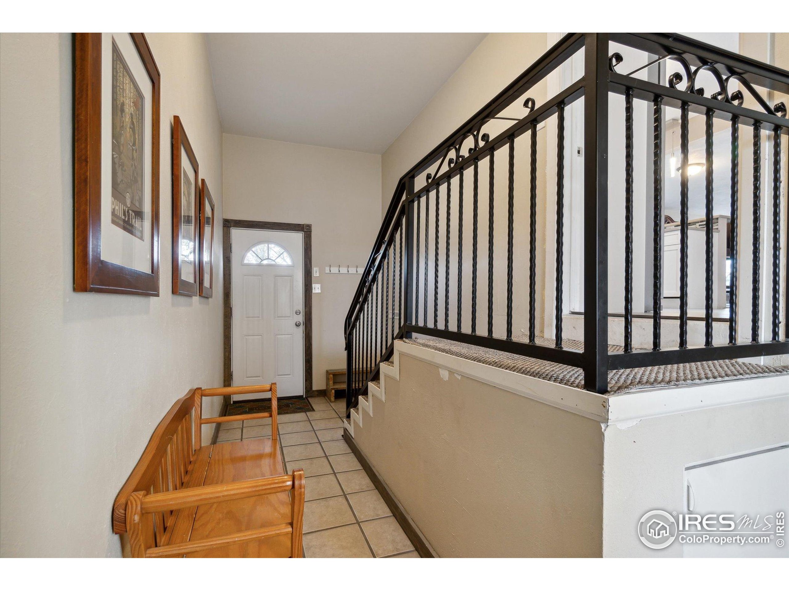 1034 Spring Drive Boulder, CO 80303 - Photo 31 of 49 a view of staircase with railing and a window