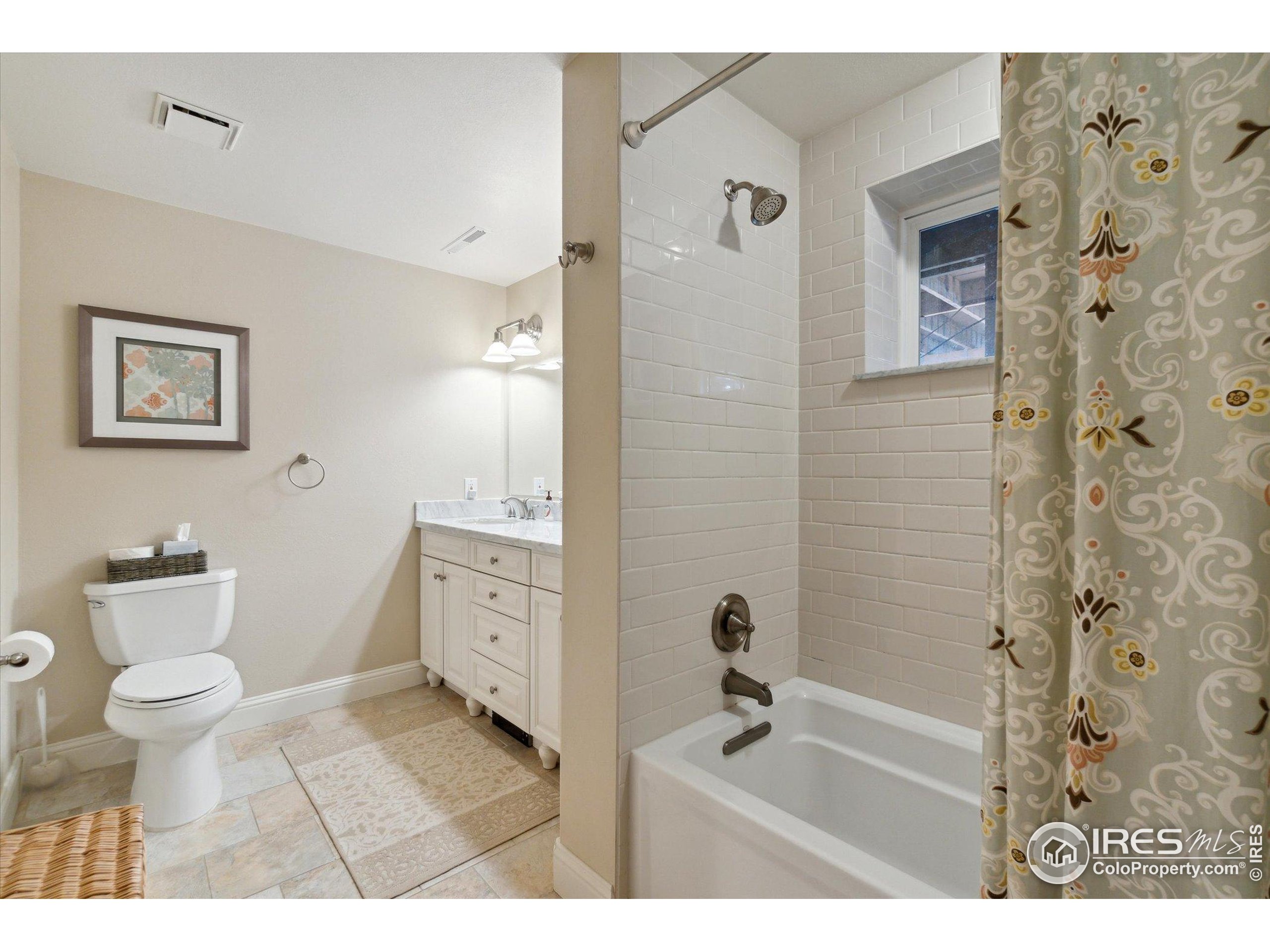 1034 Spring Drive Boulder, CO 80303 - Photo 33 of 49 a bathroom with a toilet a sink and a bathtub