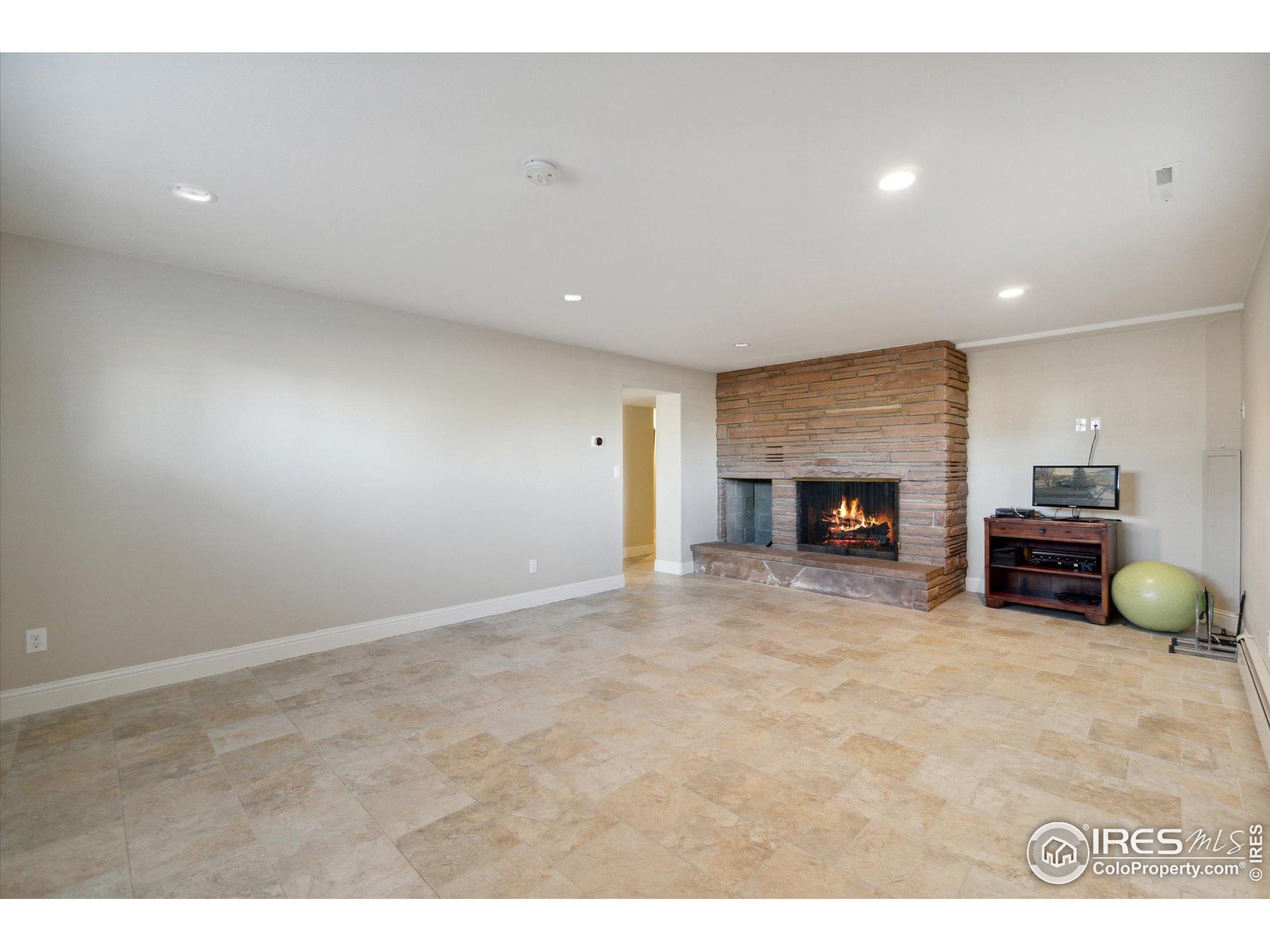 1034 Spring Drive Boulder, CO 80303 - Photo 40 of 49 a view of kitchen with furniture and fireplace