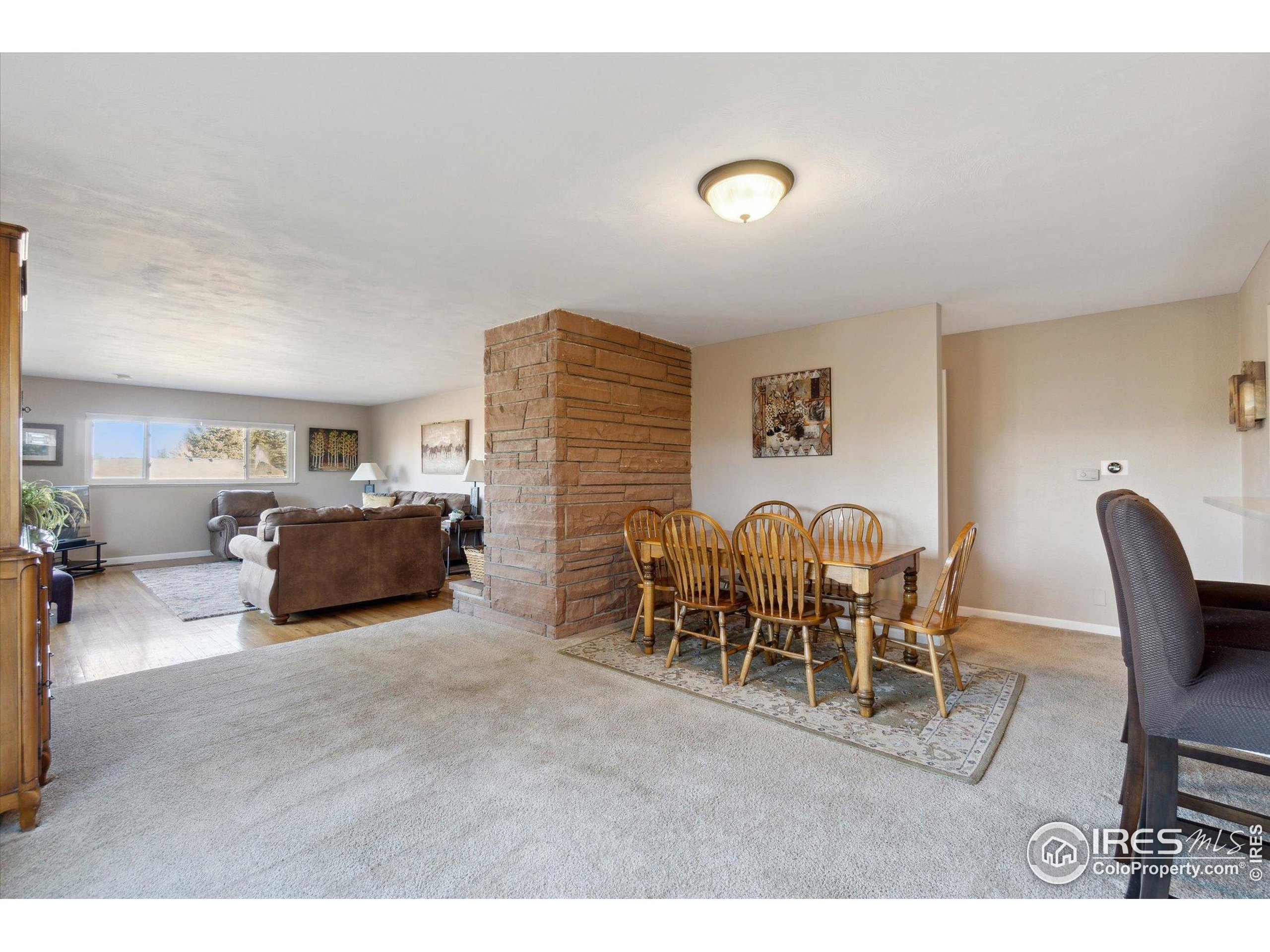 1034 Spring Drive Boulder, CO 80303 - Photo 6 of 49 a living room with furniture and a table