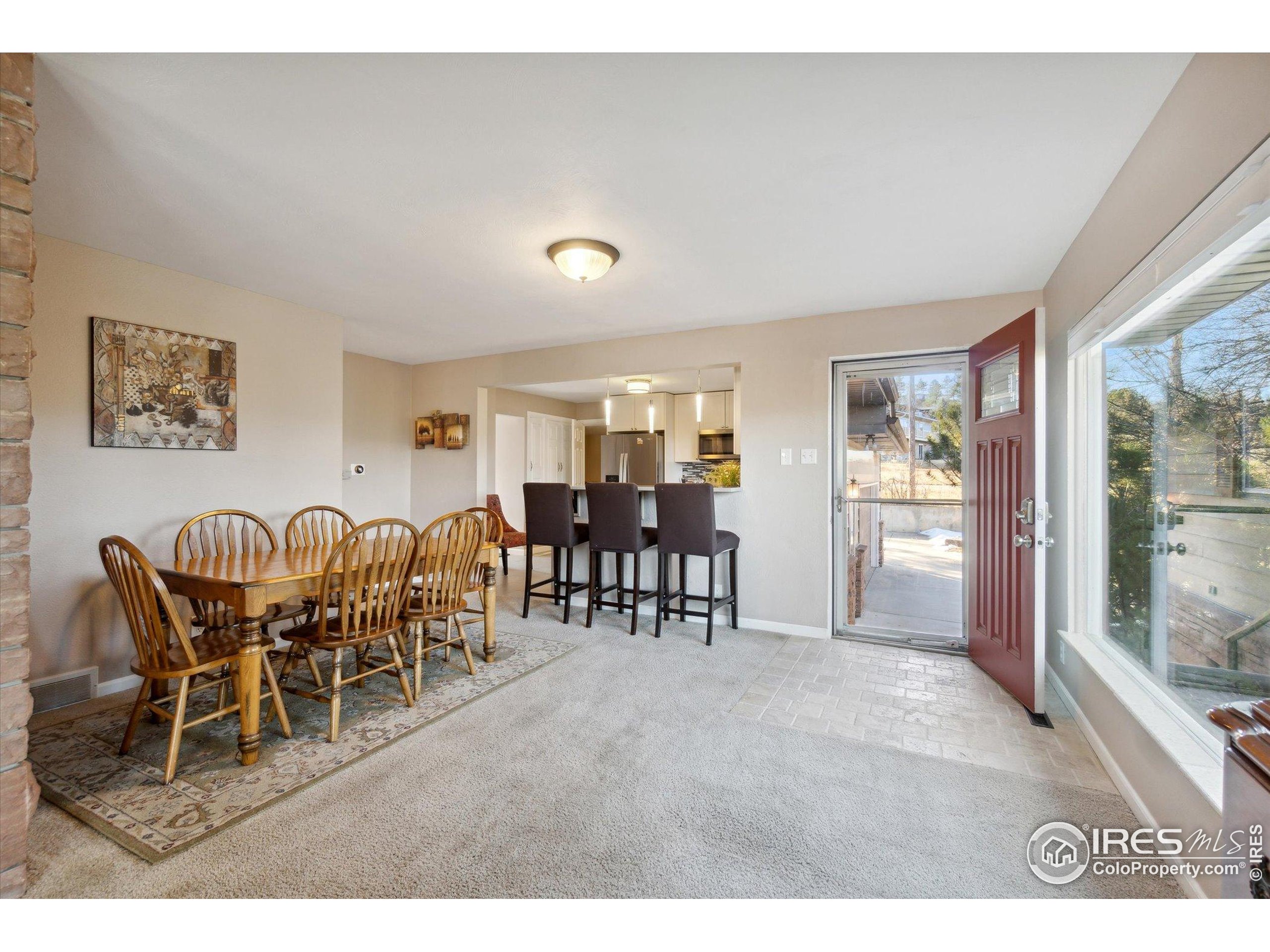 1034 Spring Drive Boulder, CO 80303 - Photo 7 of 49 a view of a dining room with furniture