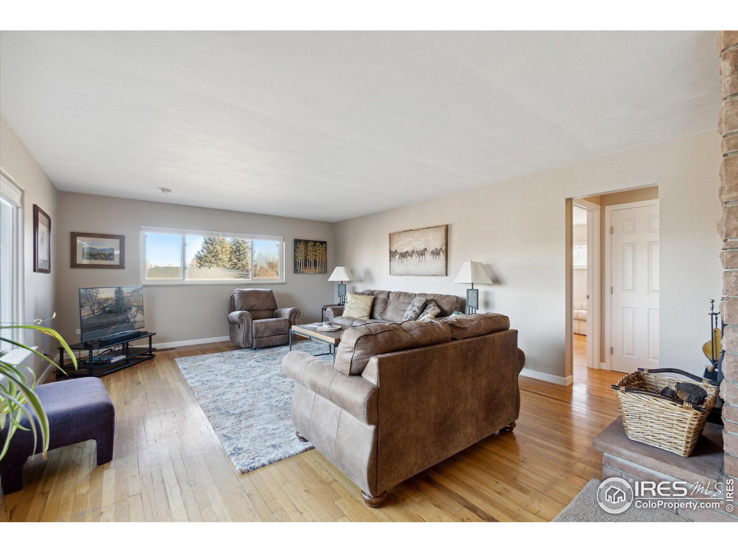 1034 Spring Drive Boulder, CO 80303 - Photo 8 of 49 a living room with furniture and a couch