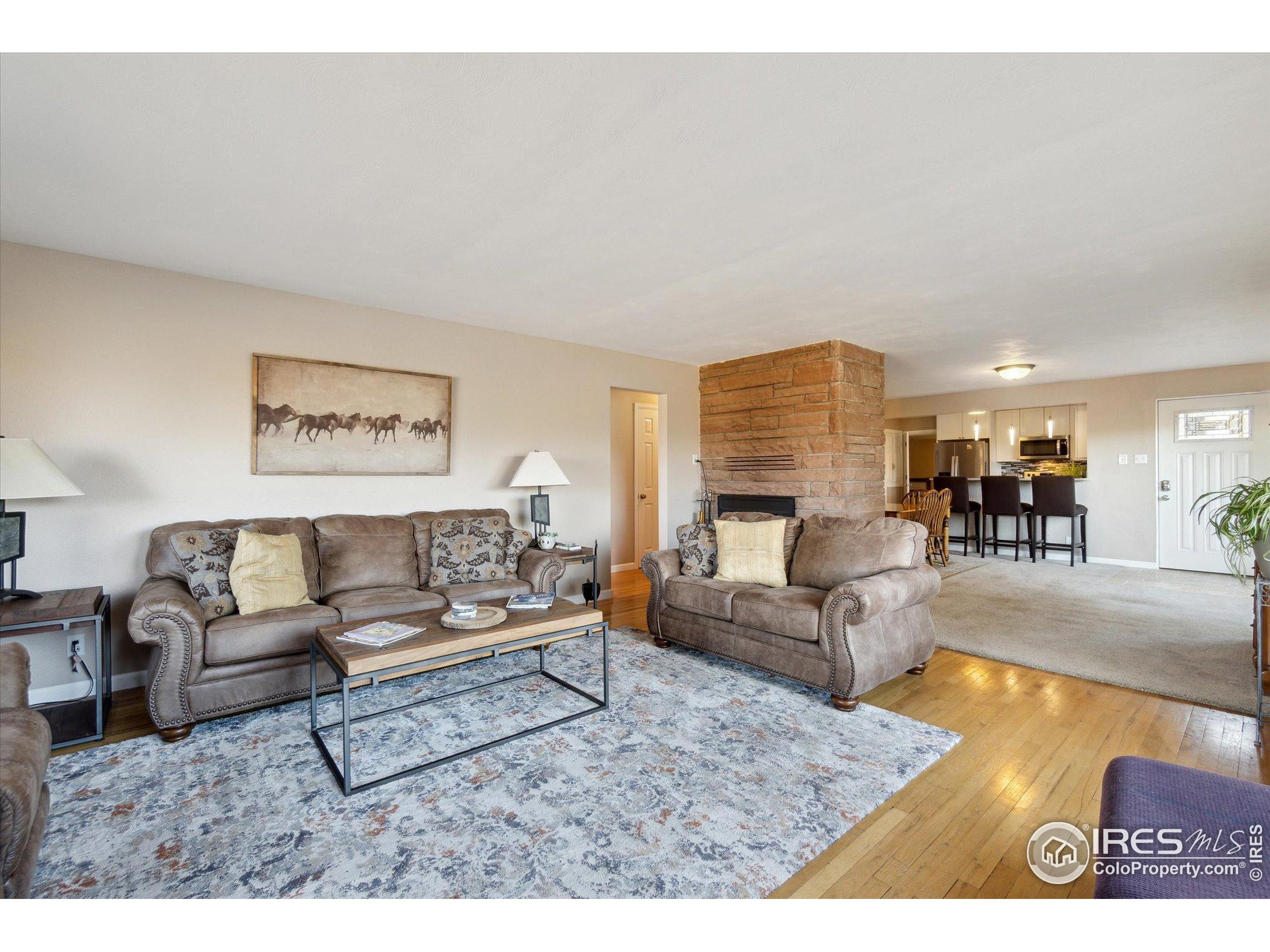 1034 Spring Drive Boulder, CO 80303 - Photo 9 of 49 a living room with furniture and a table