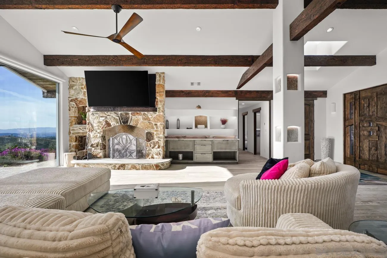 13155 McNally Road Valley Center, CA 92082 - Photo 14 of 69 a living room with furniture and a flat screen tv