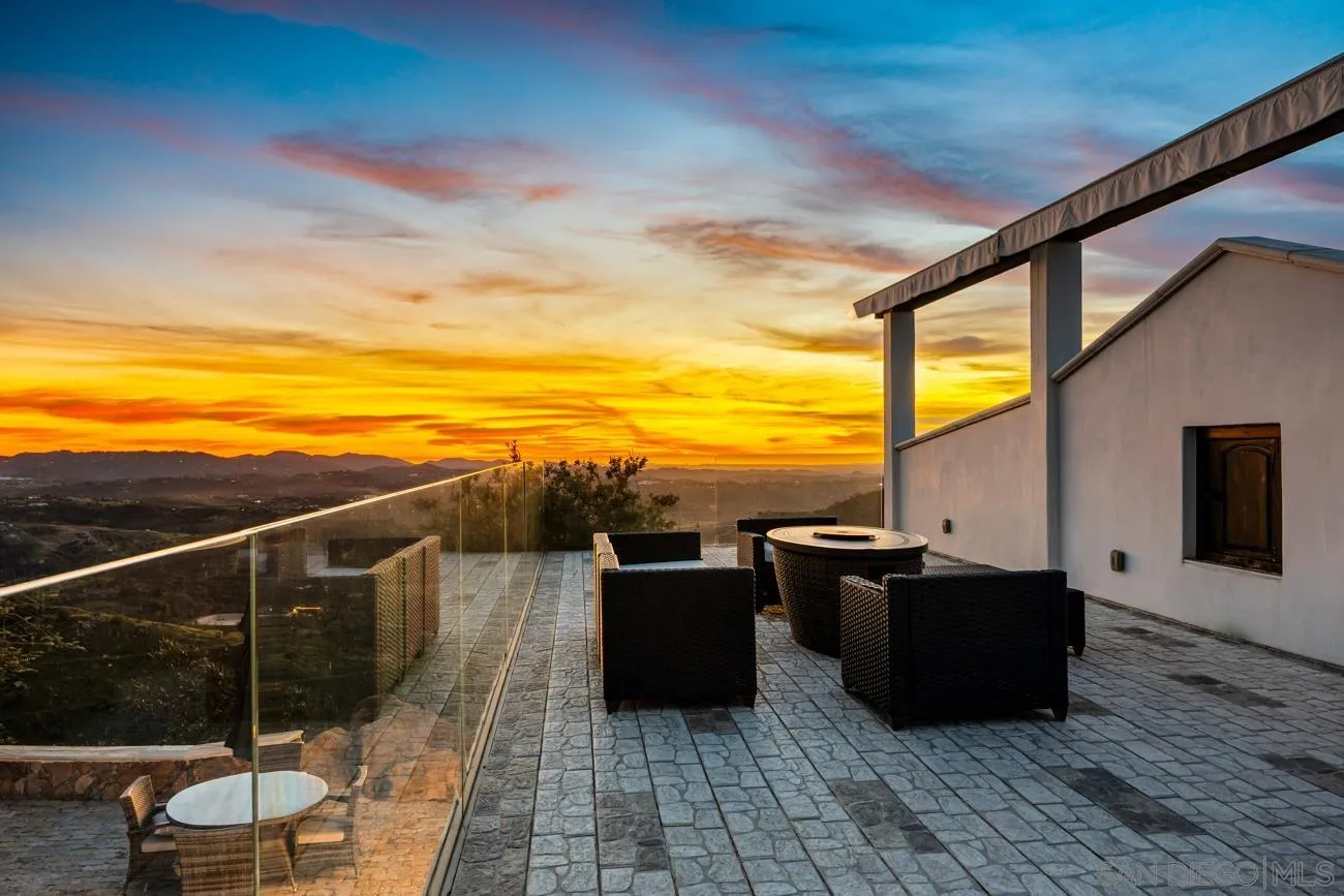 13155 McNally Road Valley Center, CA 92082 - Photo 38 of 69 a view of a terrace with wooden floor and a ocean view