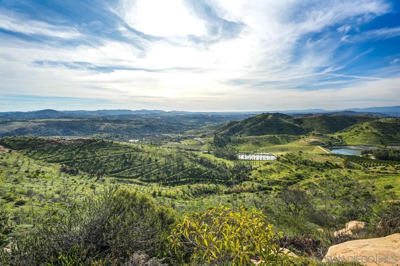 13155 McNally Road Valley Center, CA 92082 - Photo 53 of 69 a view of a lake with mountains in the background