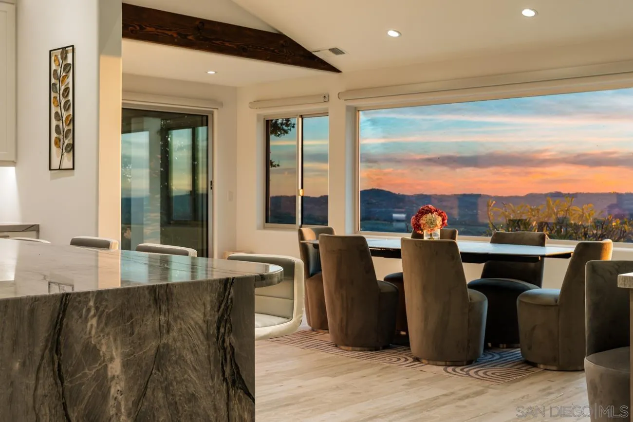 13155 McNally Road Valley Center, CA 92082 - Photo 6 of 69 a view of a living room and kitchen with furniture