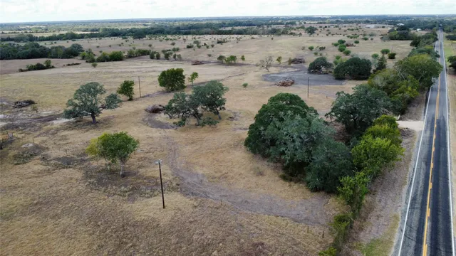 an aerial view of mountain with beach