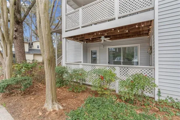 a view of a house with plants