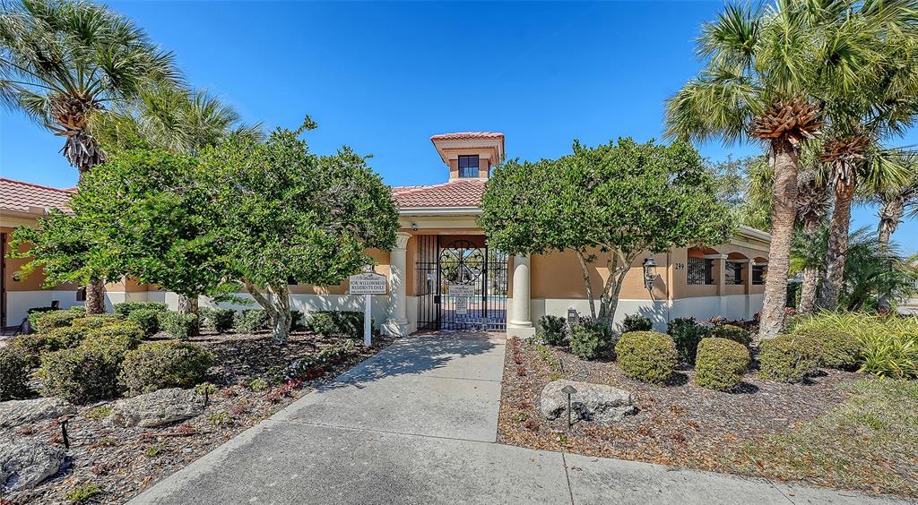 665 Crane Prairie Way Osprey, FL 34229 - Photo 52 of 61 a front view of a house with a yard