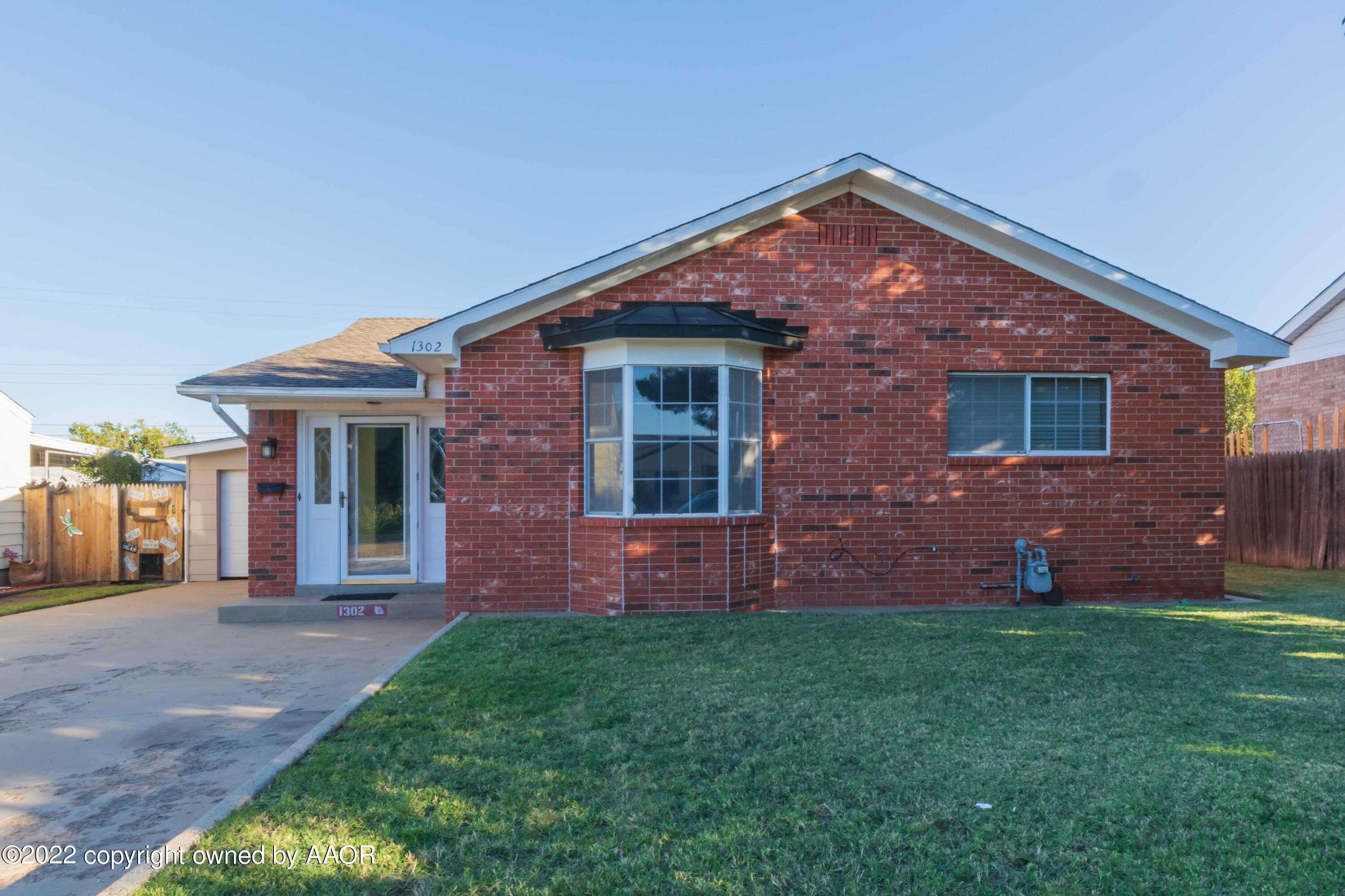 1302 Potter Street Borger, TX 79007 - Photo 1 of 53 front view of house with a yard