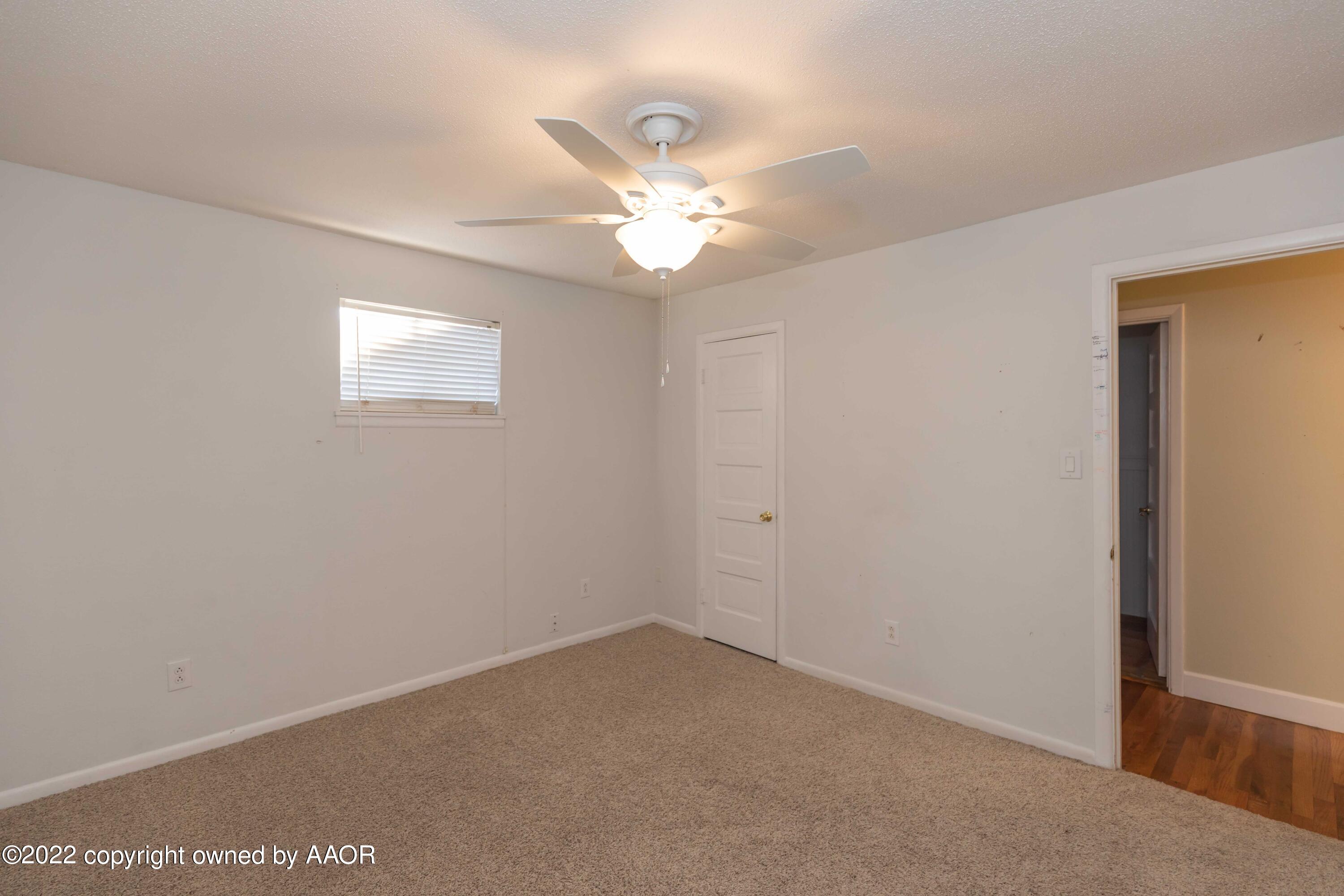 1302 Potter Street Borger, TX 79007 - Photo 27 of 53 a view of an empty room with a window