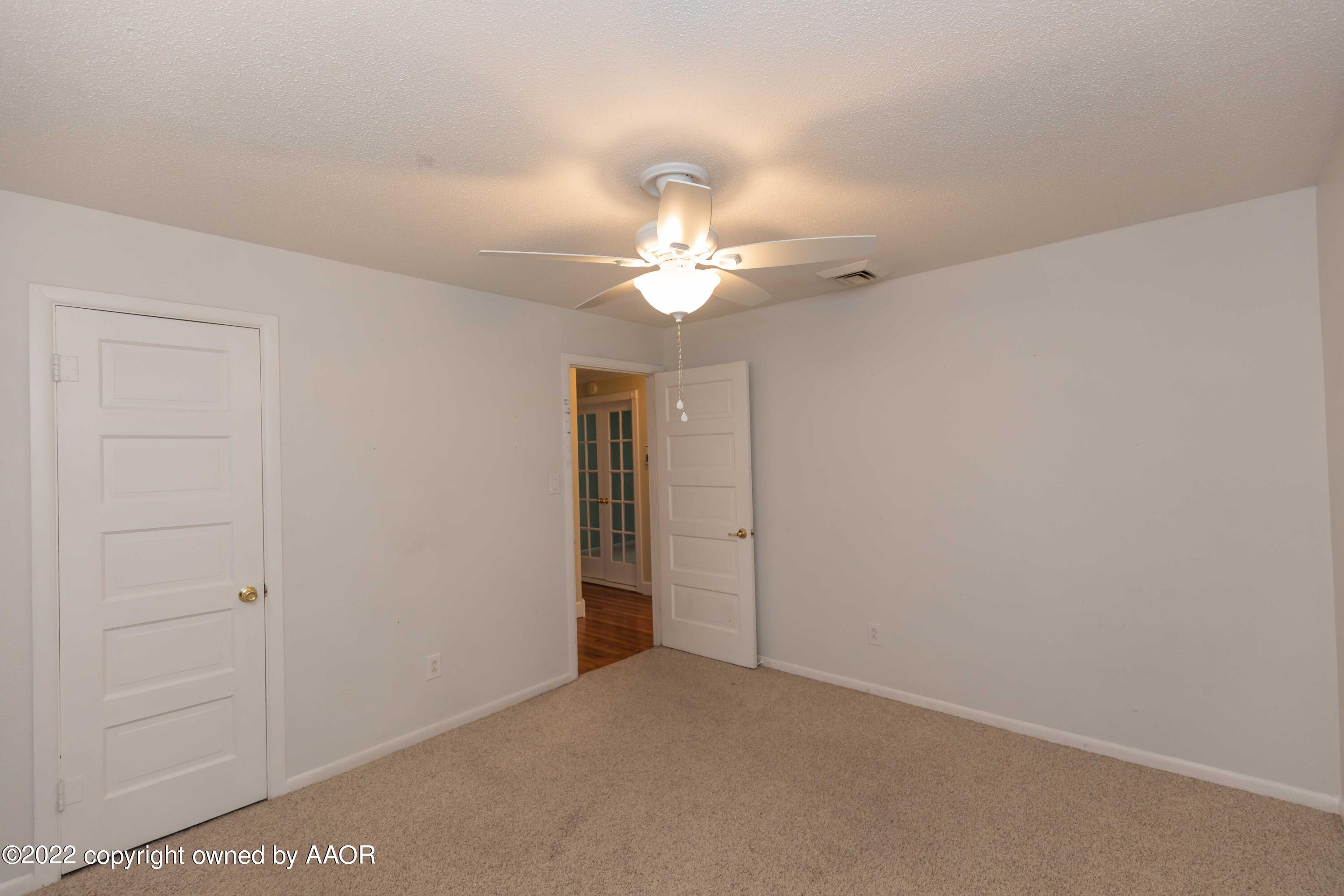 1302 Potter Street Borger, TX 79007 - Photo 28 of 53 a view of a chandelier fan in a room