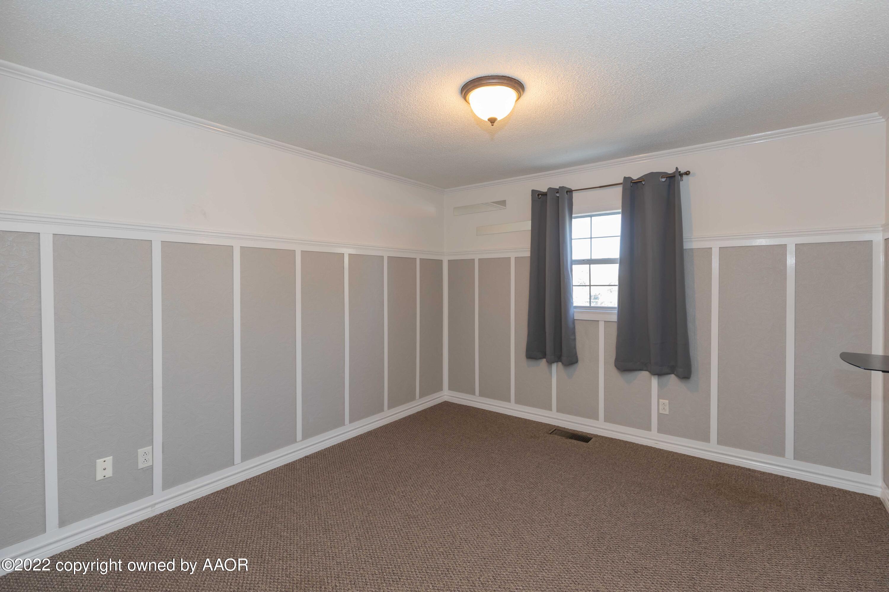 1302 Potter Street Borger, TX 79007 - Photo 44 of 53 an empty room with windows and entrance