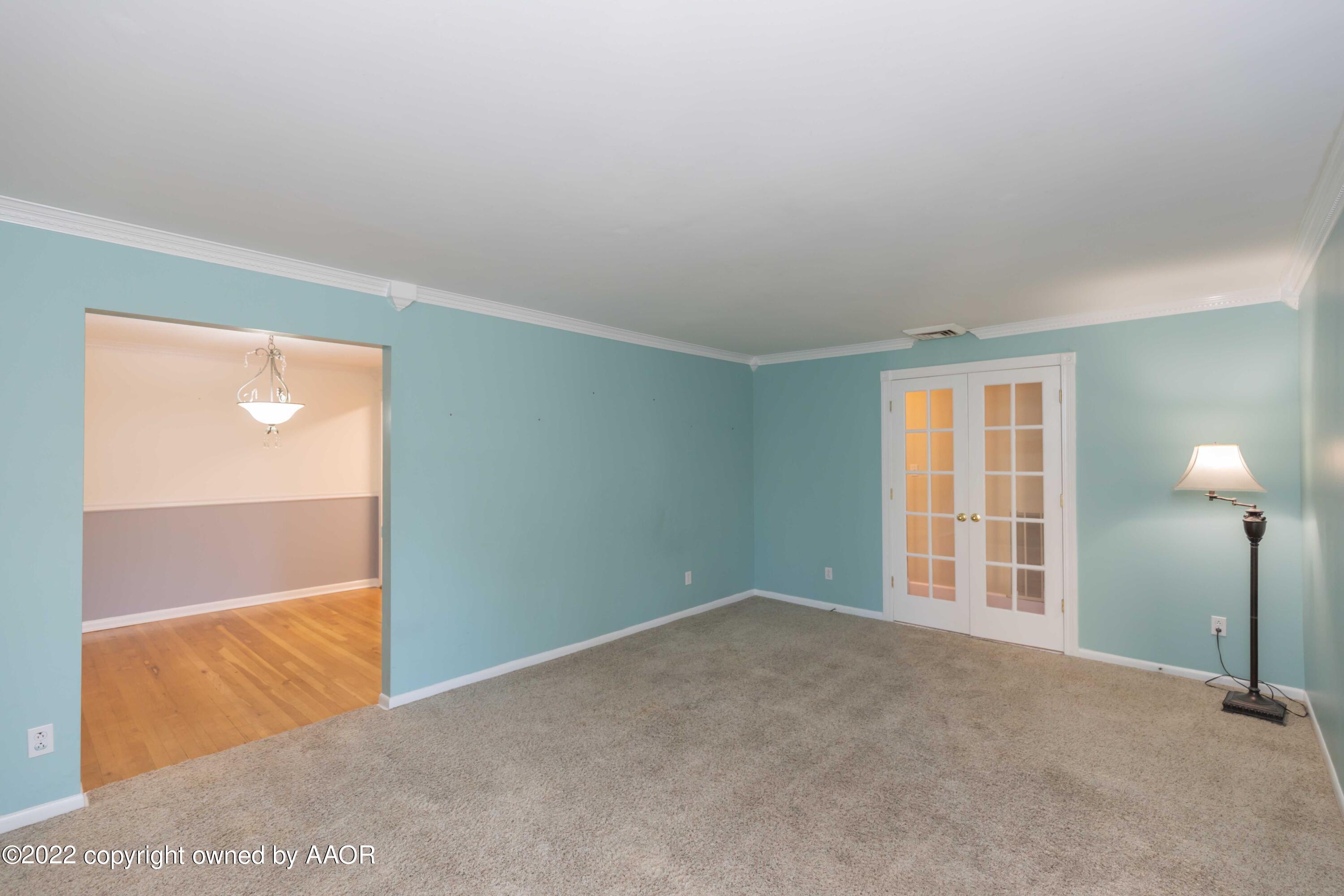 1302 Potter Street Borger, TX 79007 - Photo 7 of 53 an empty room with windows