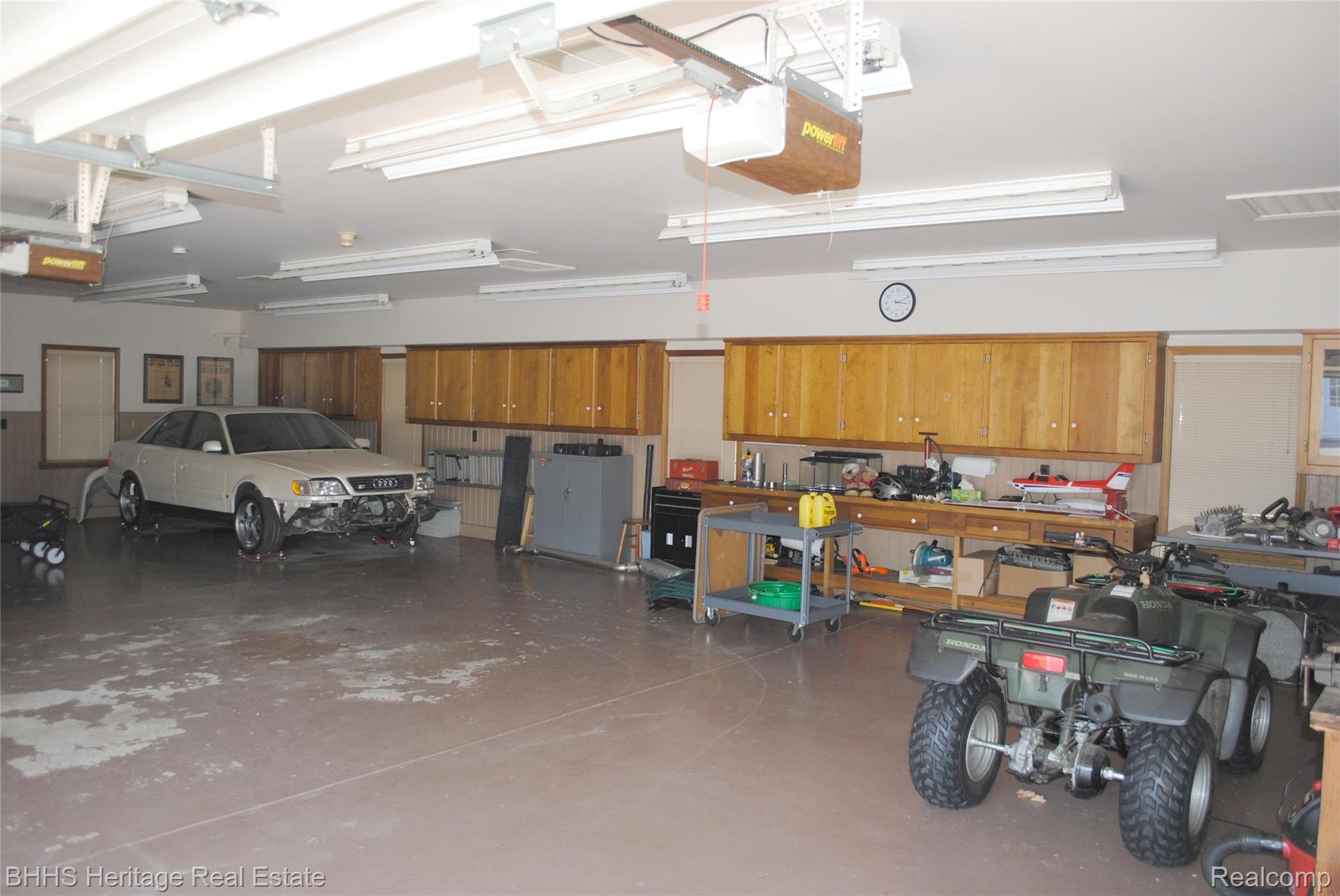 4450 Golf Club Road Howell, MI 48843 - Photo 44 of 59 Interior of the main level of the 3 car garage