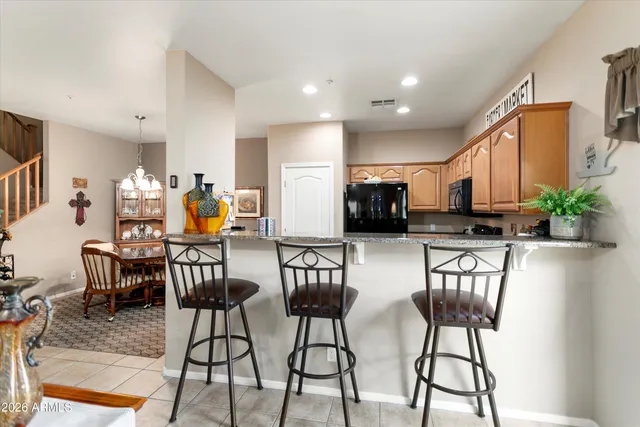 a view of a dining room with furniture