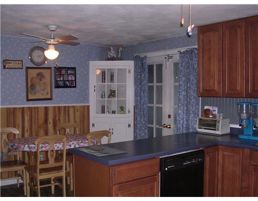 110 Strawberry Field Road Warwick, RI 02886 - Photo 5 of 12 Kitchen. French door to oversized rear deck.