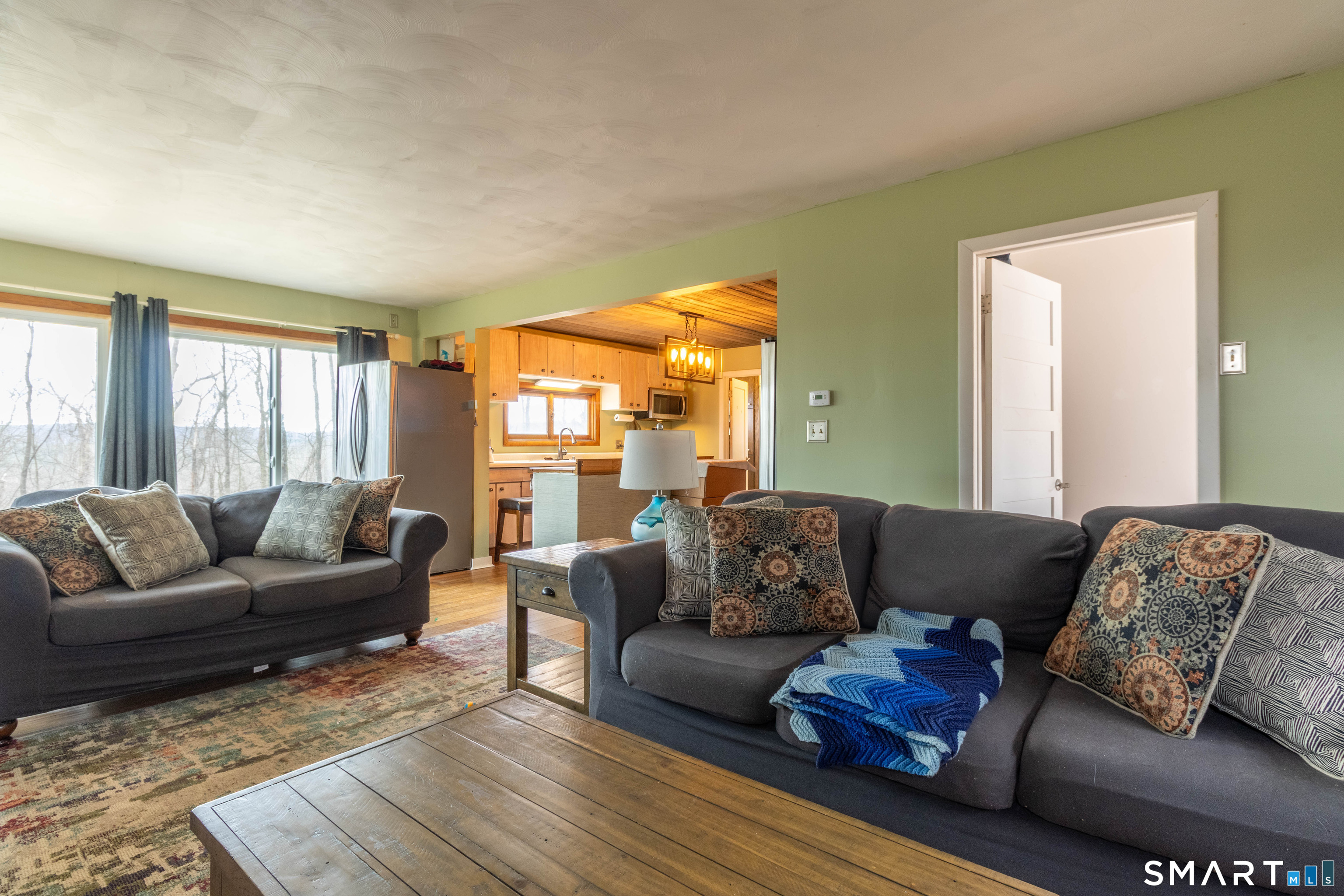 40 Sanitarium Road Windham, CT 06226 - Photo 11 of 33 a living room with furniture and a large window