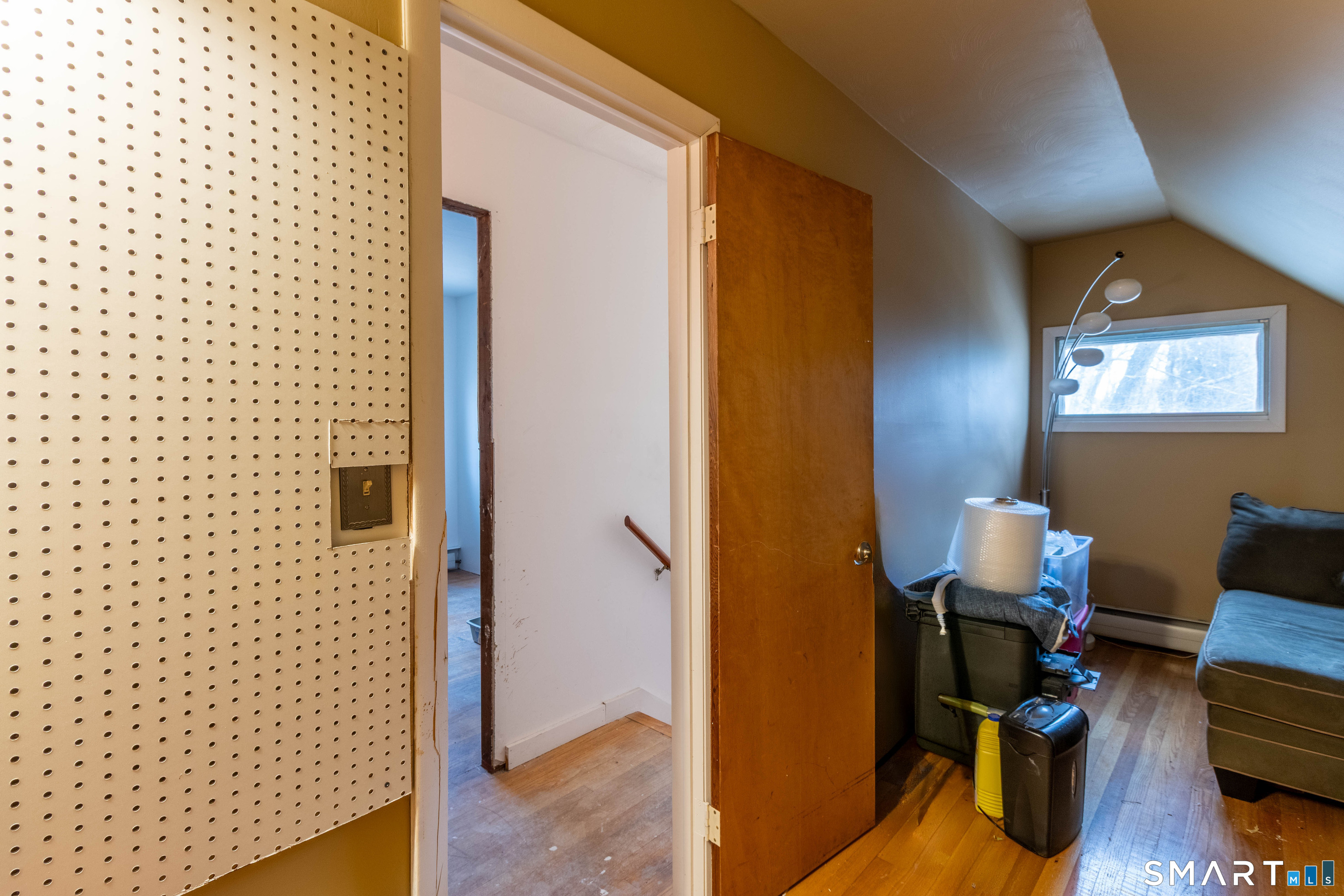 40 Sanitarium Road Windham, CT 06226 - Photo 24 of 33 a view of a workspace with furniture and wooden floor