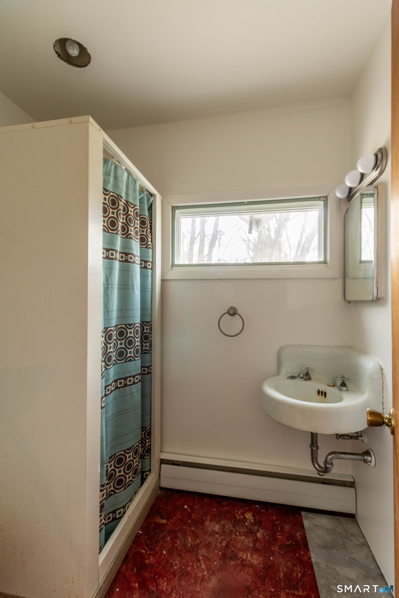 40 Sanitarium Road Windham, CT 06226 - Photo 26 of 33 a bathroom with a sink toilet and shower