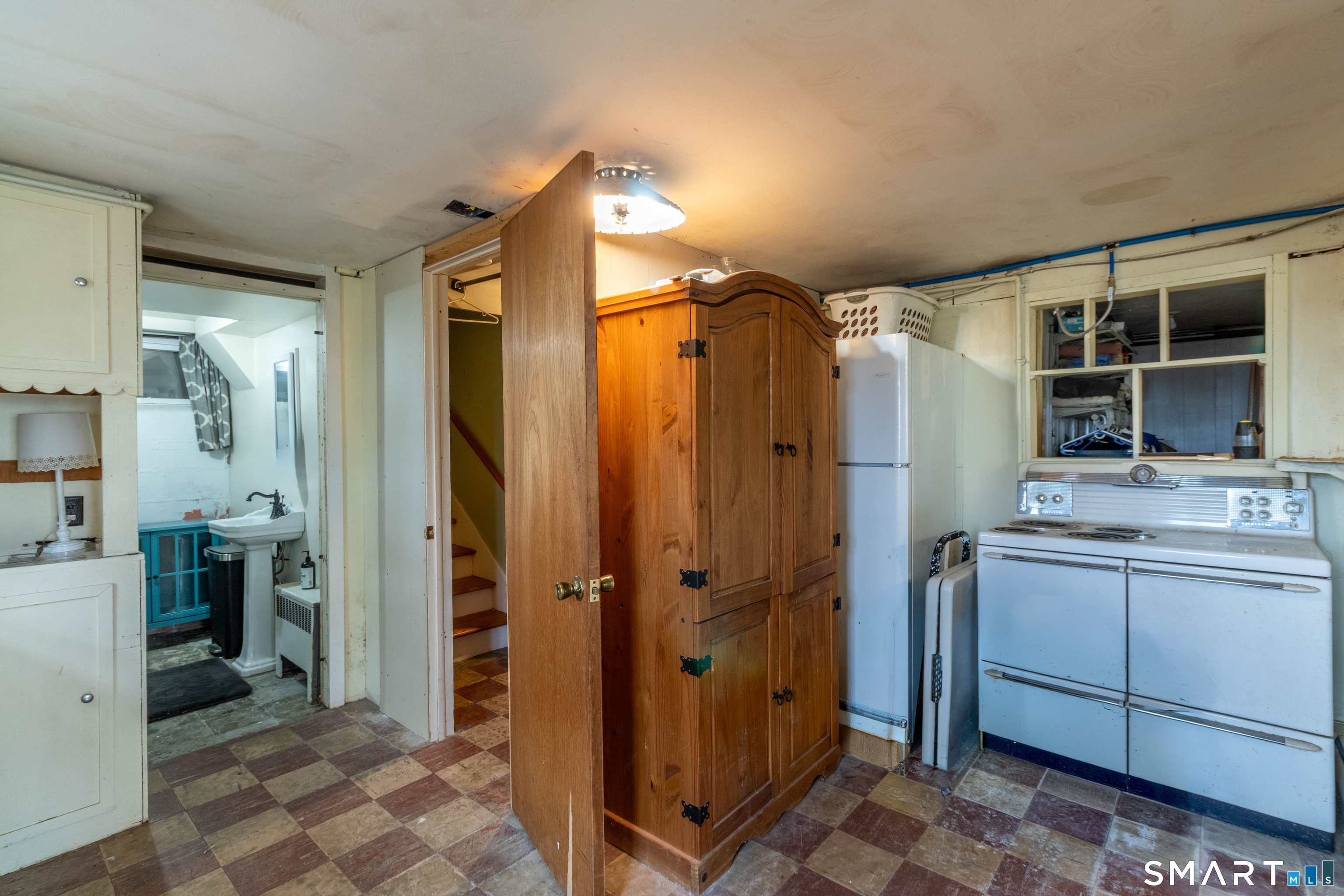 40 Sanitarium Road Windham, CT 06226 - Photo 33 of 33 a bathroom with a shower sink and mirror