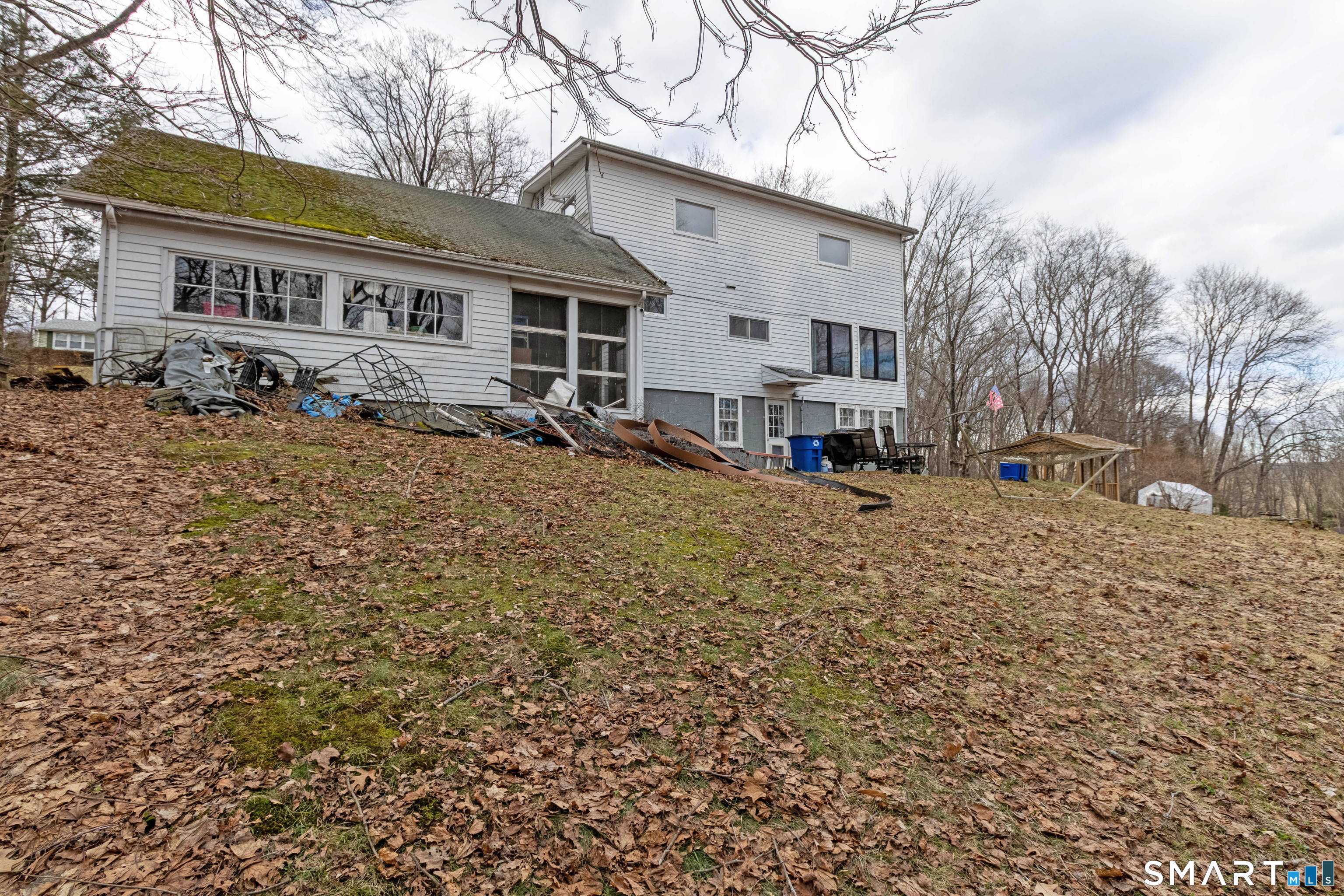 40 Sanitarium Road Windham, CT 06226 - Photo 8 of 33 a view of a house with a yard covered in snow