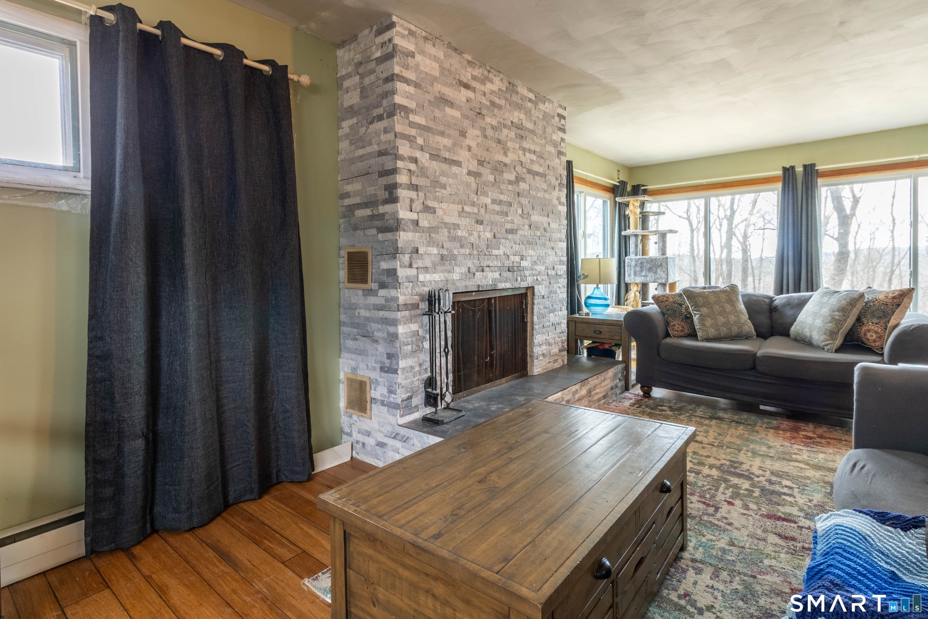 40 Sanitarium Road Windham, CT 06226 - Photo 10 of 33 a living room with furniture and a fireplace