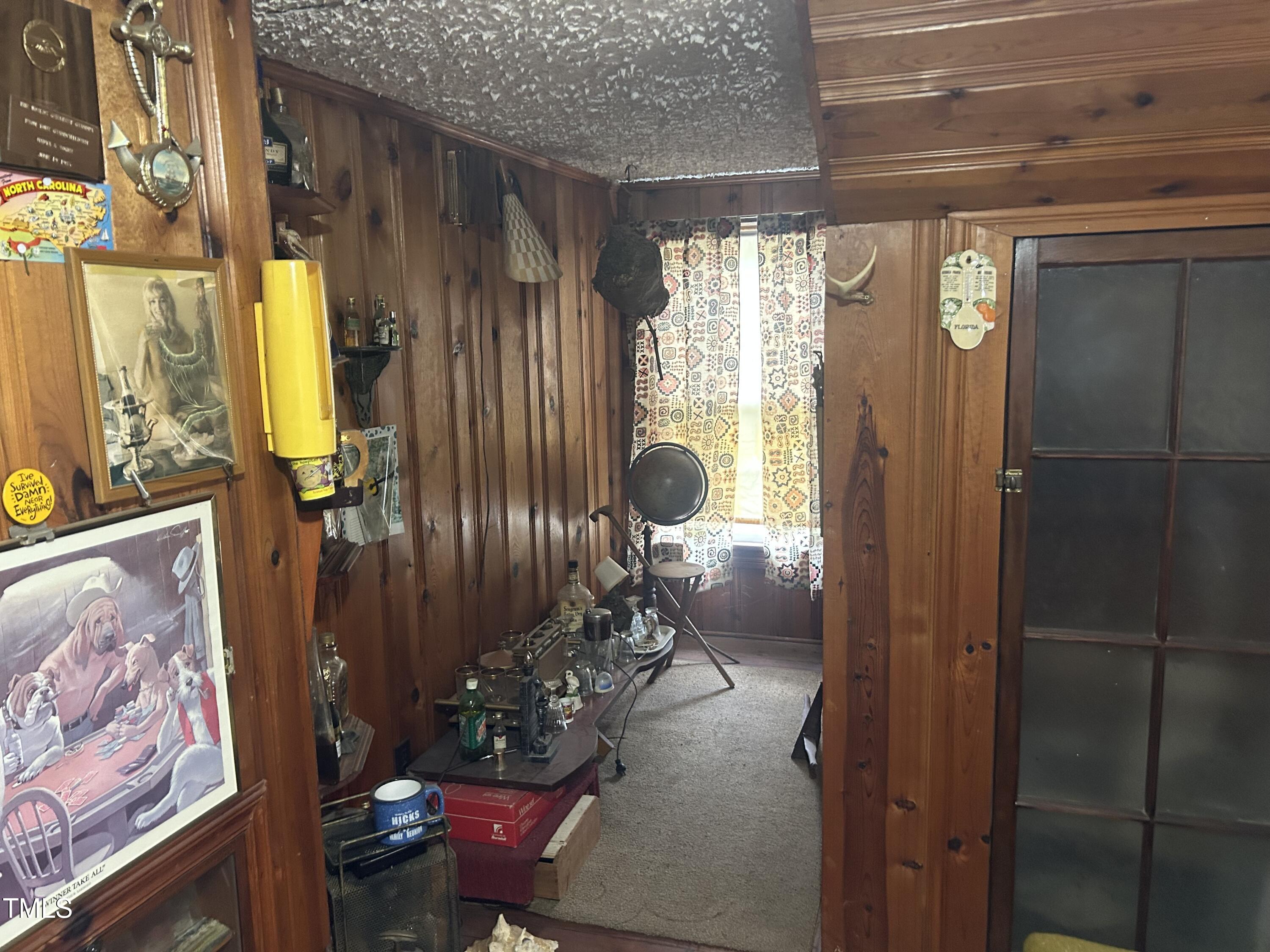 45 Perkinson Street Kittrell, NC 27544 - Photo 10 of 18 a living room with furniture and a window