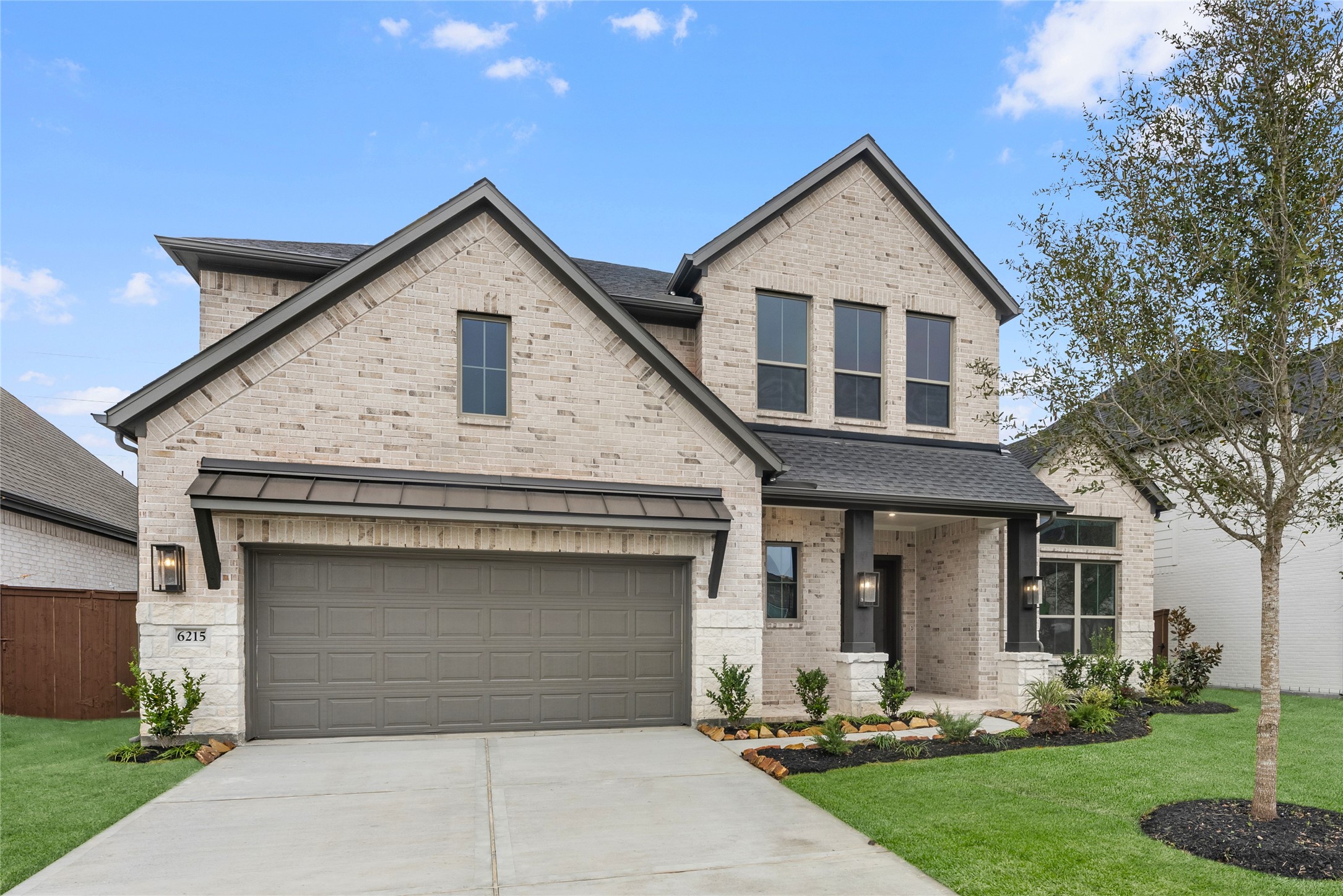6215 Parthenon Drive Manvel, TX 77578 - Photo 1 of 30 Move in Ready. Westin Homes *New Construction* Asher IX Plan. Grass is digitally enhanced.