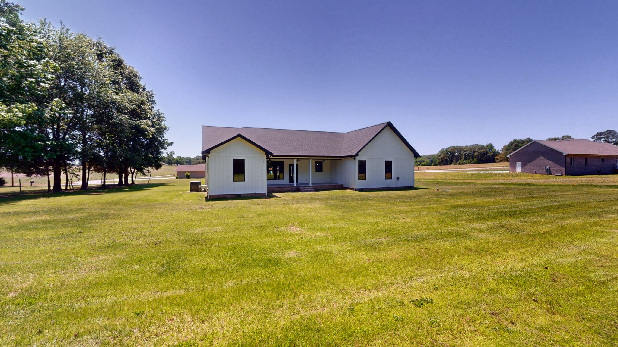 865 Alman Cemetery Road Paris, TN 38242 - Photo 34 of 41 a house with swimming pool in front of it