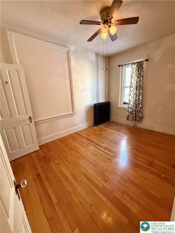 326 West Broad Street, Unit 1 Bethlehem, PA 18018 - Photo 5 of 9 a view of empty room with wooden floor and fan