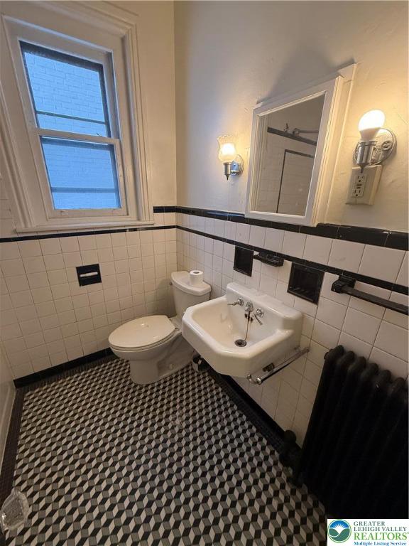 326 West Broad Street, Unit 1 Bethlehem, PA 18018 - Photo 6 of 9 a bathroom with a sink and a mirror