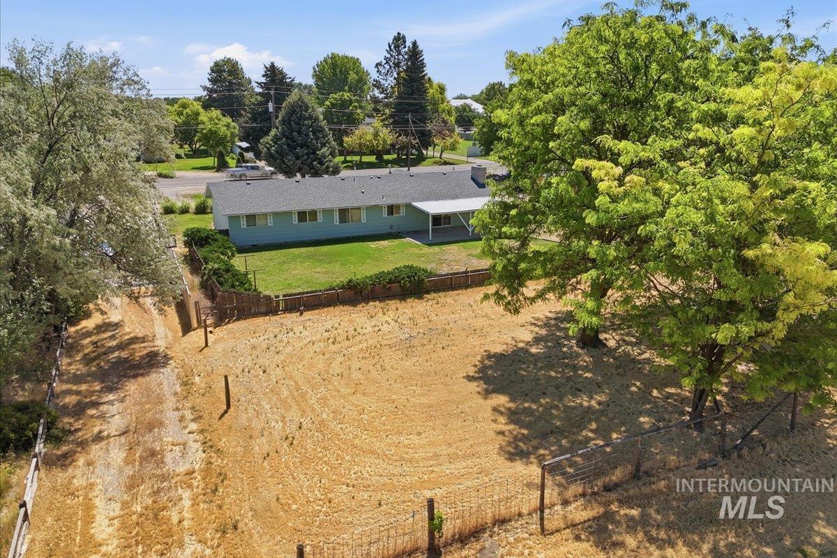 1311 North Middleton Road Nampa, ID 83651 - Photo 13 of 49 Expansive undeveloped lot featuring mature trees and partial fencing