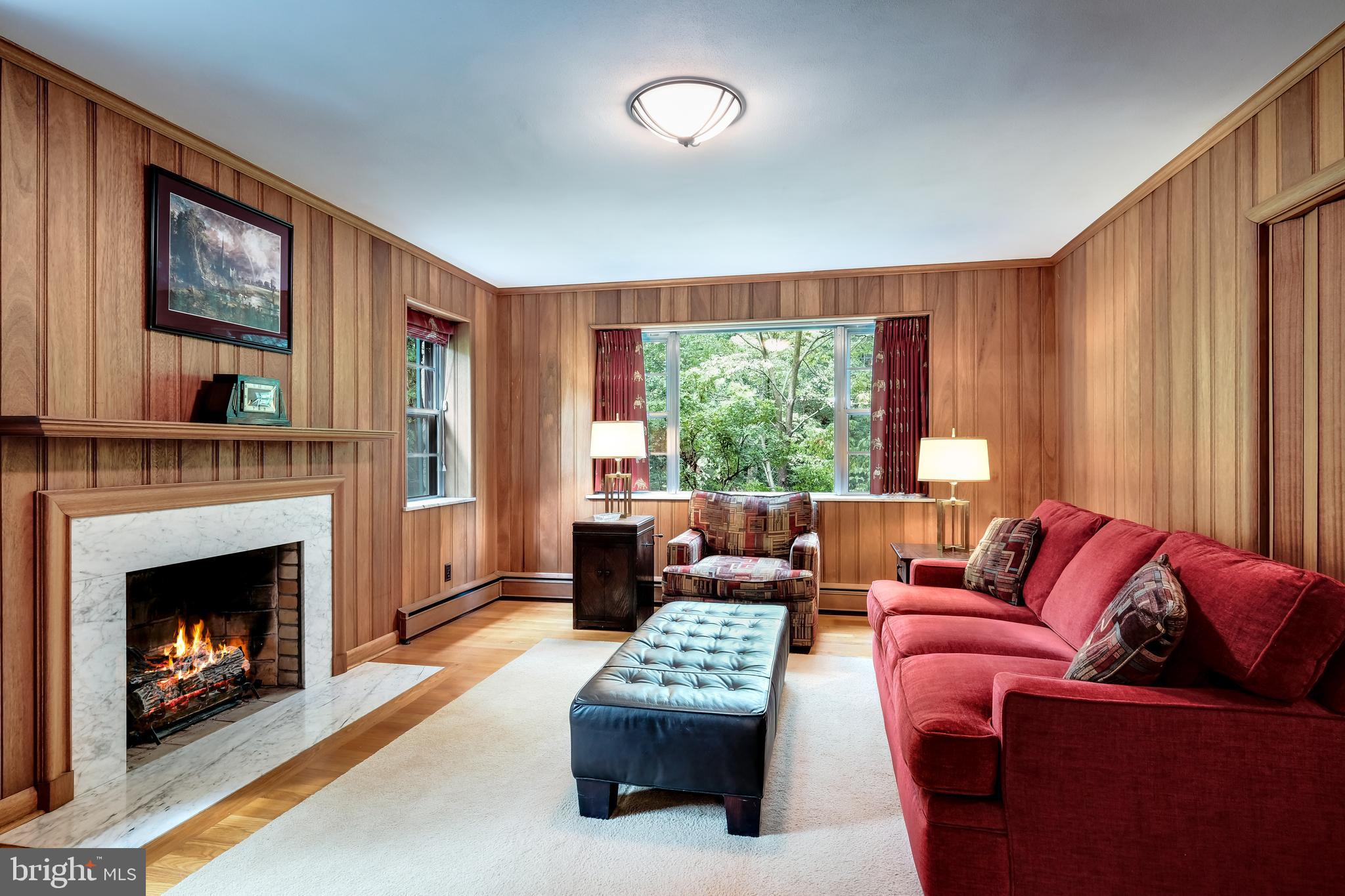 800 Chauncey Road Penn Valley, PA 19072 - Photo 12 of 35 Paneled Den with gas fireplace