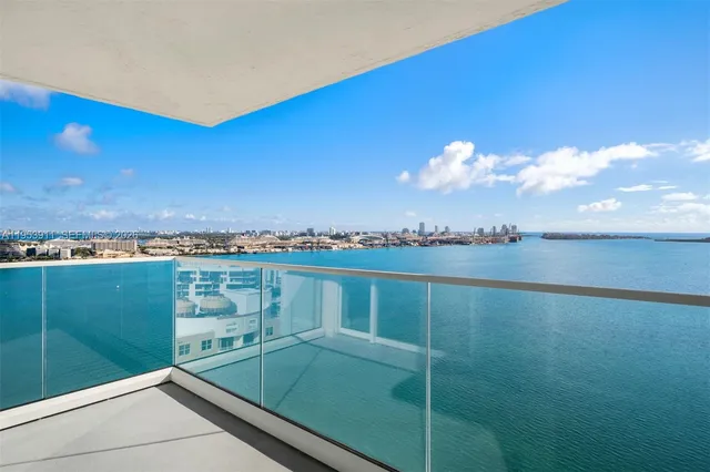 a kitchen with granite countertop a sink and a window