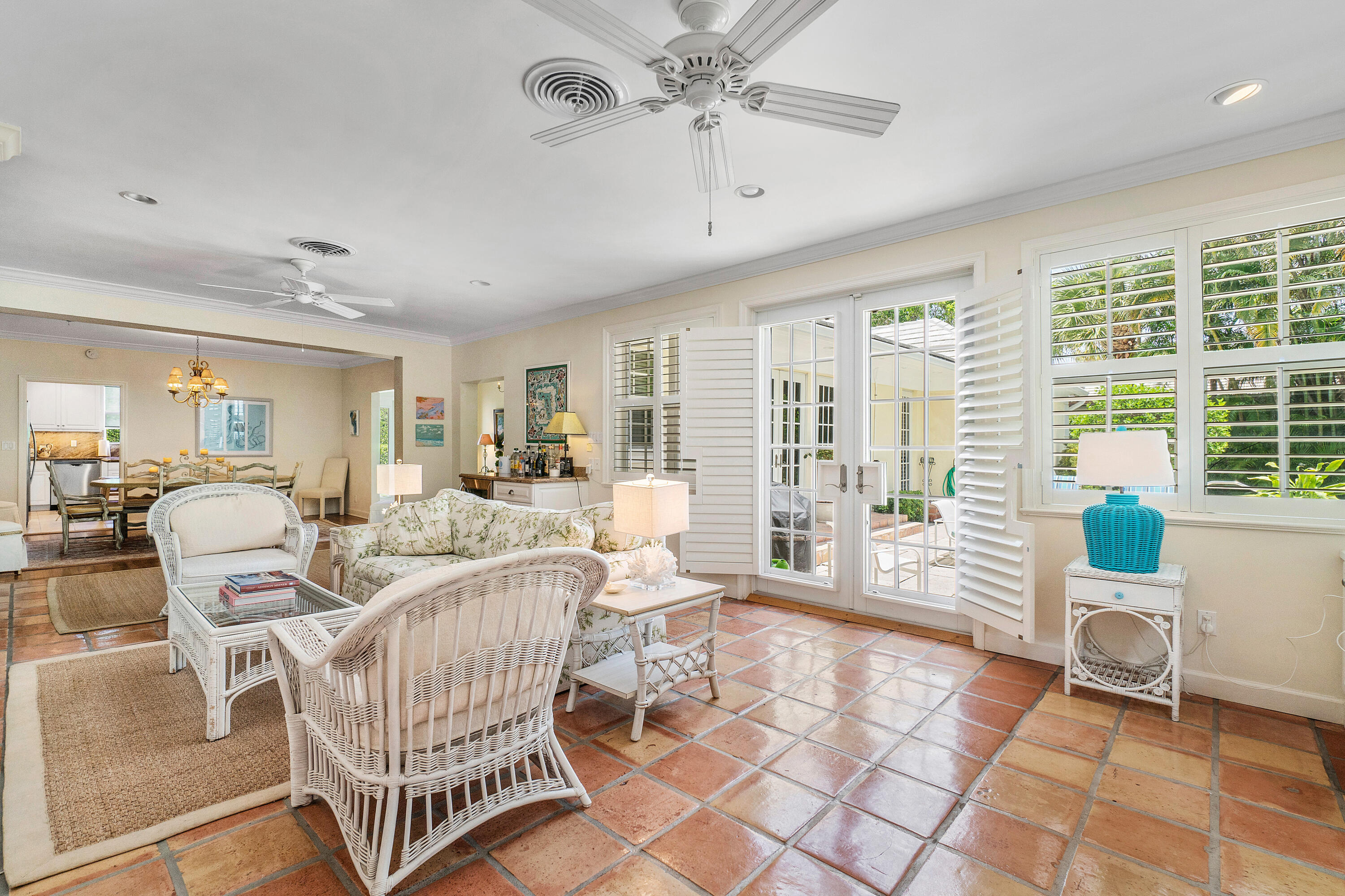 230 Plantation Road Palm Beach, FL 33480 - Photo 11 of 30 a living room with patio furniture and a large window