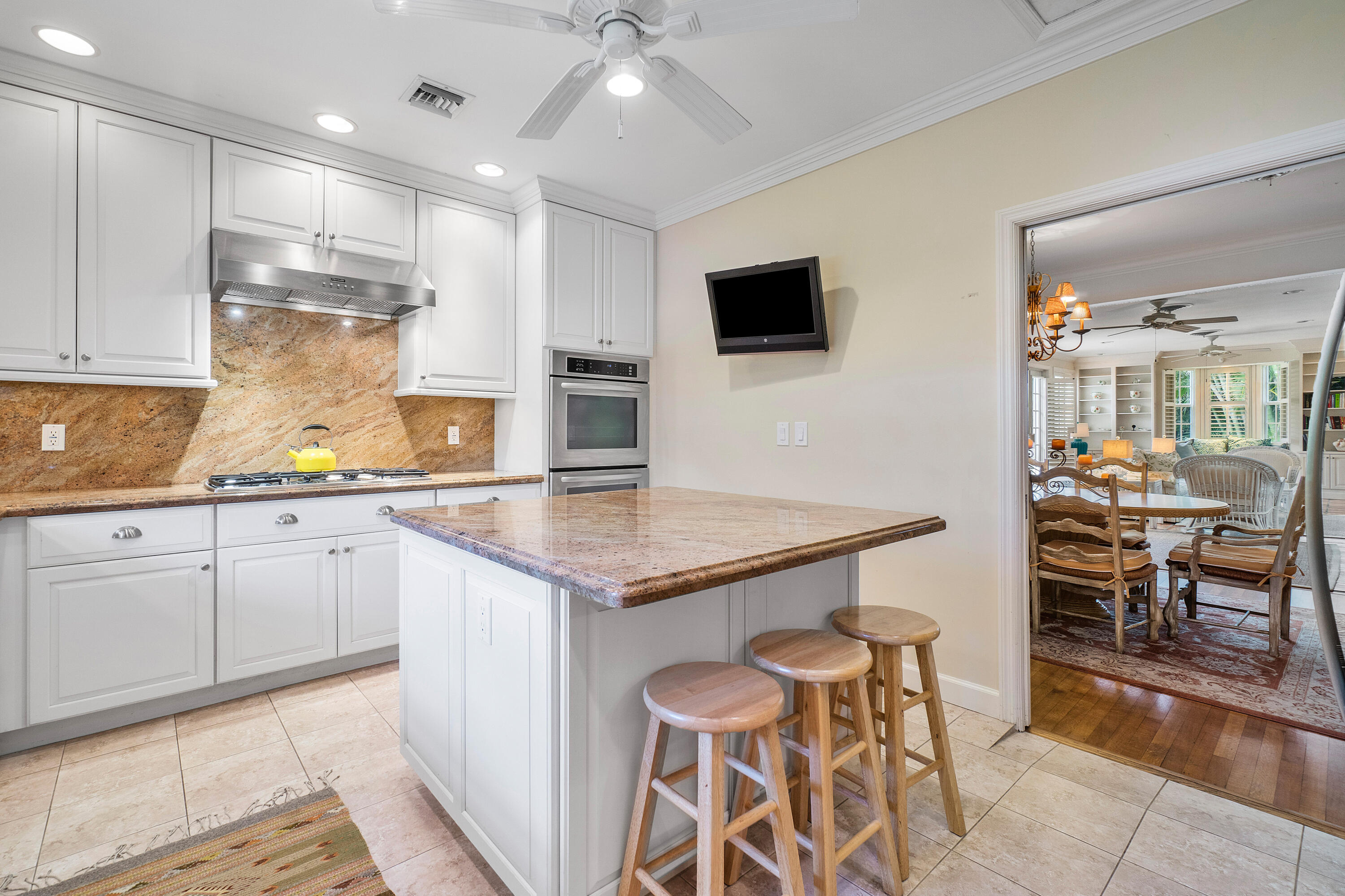 230 Plantation Road Palm Beach, FL 33480 - Photo 13 of 30 a kitchen with stainless steel appliances granite countertop a sink and a stove