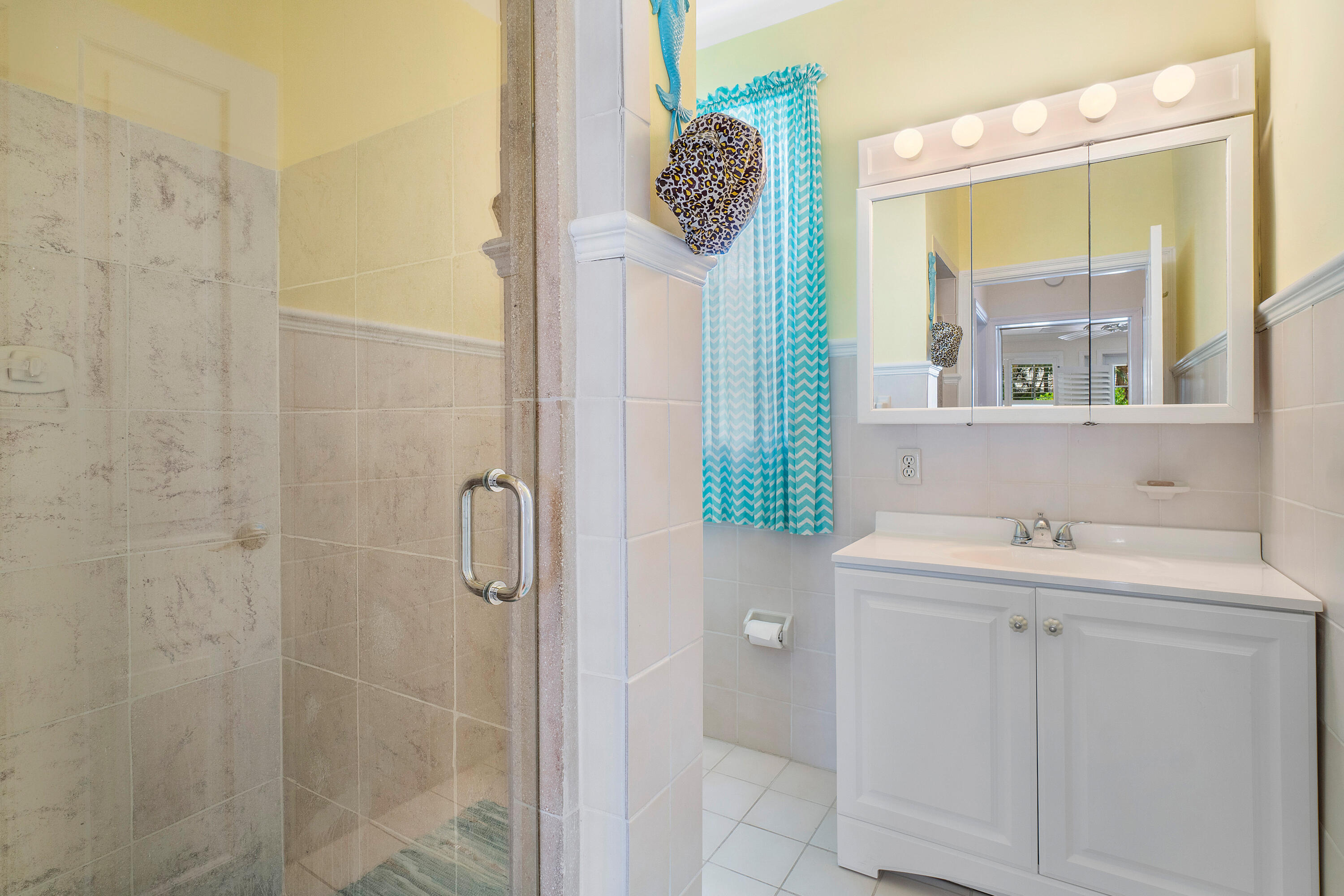 230 Plantation Road Palm Beach, FL 33480 - Photo 26 of 30 a bathroom with a sink a toilet and shower