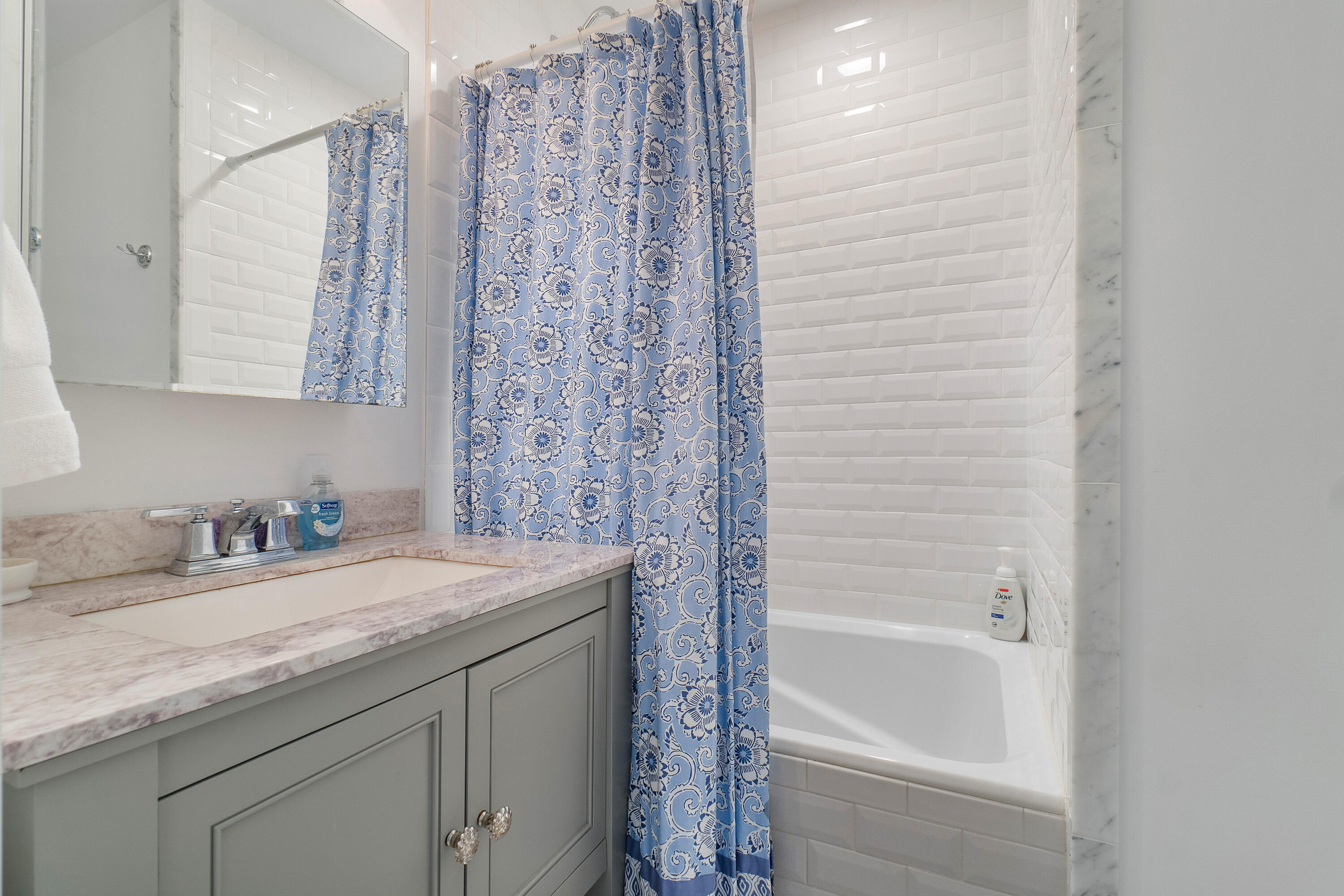230 Plantation Road Palm Beach, FL 33480 - Photo 28 of 30 a bathroom with a granite countertop sink a toilet and bathtub