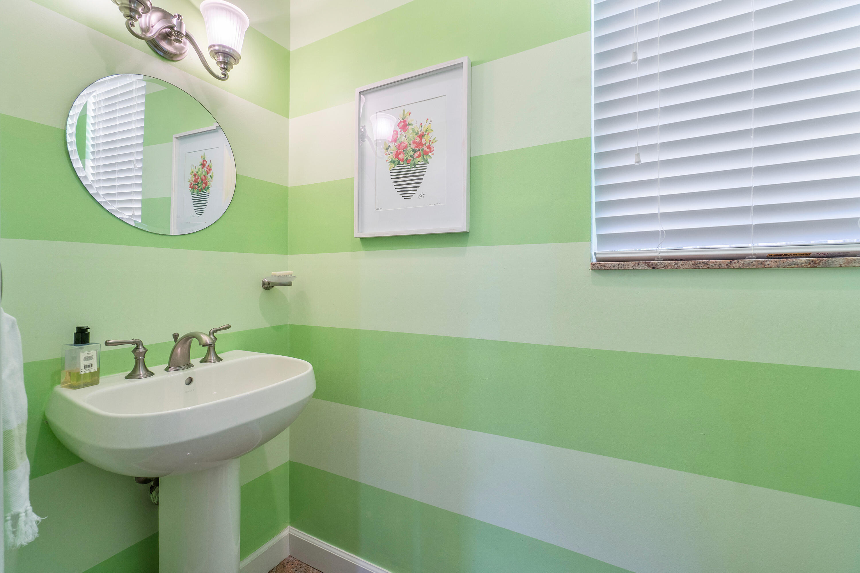 230 Plantation Road Palm Beach, FL 33480 - Photo 29 of 30 a bathroom with a sink and a mirror