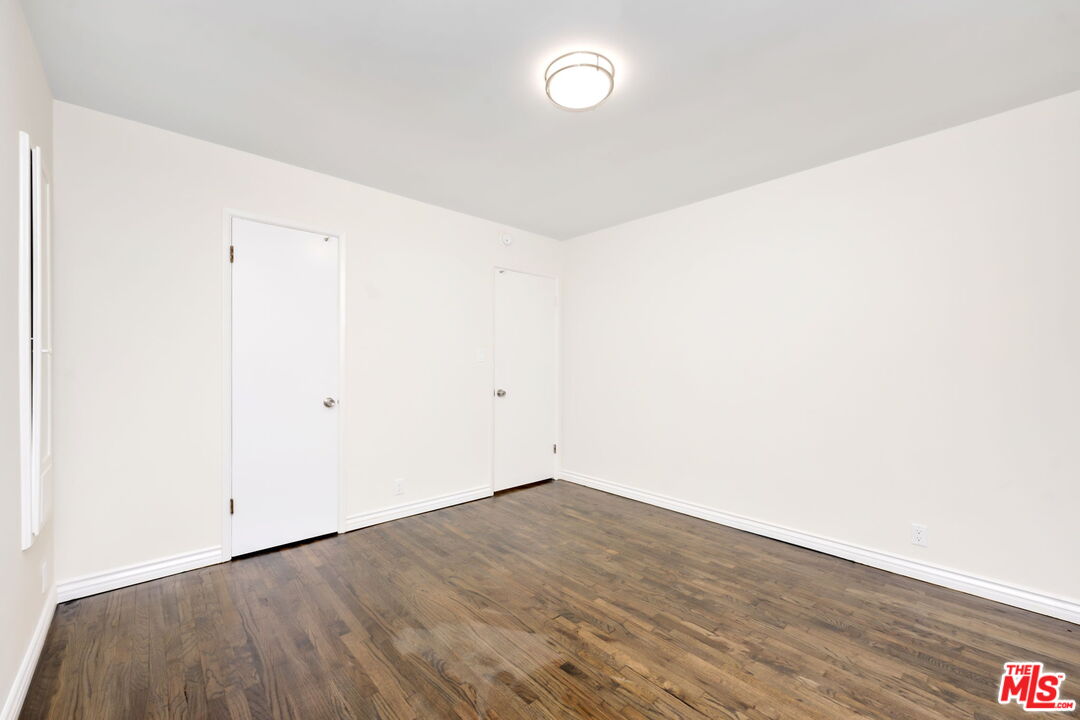 2007 East Villa Street, Unit A Pasadena, CA 91107 - Photo 11 of 12 a view of a room with wooden floor