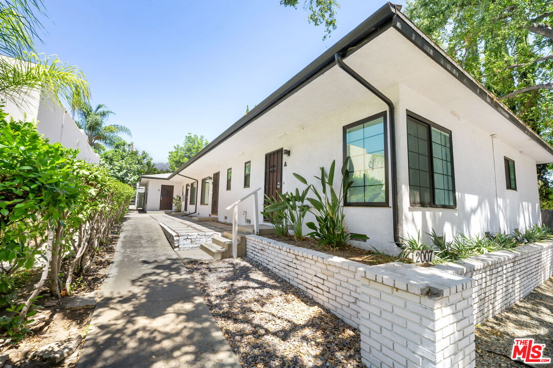 2007 East Villa Street, Unit A Pasadena, CA 91107 - Photo 3 of 12 a view of a house with backyard and sitting area