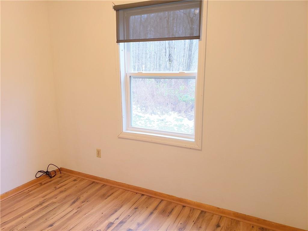 548 New Castle Road Slippery Rock, PA 16057 - Photo 27 of 36 a view of room with window and hardwood floor