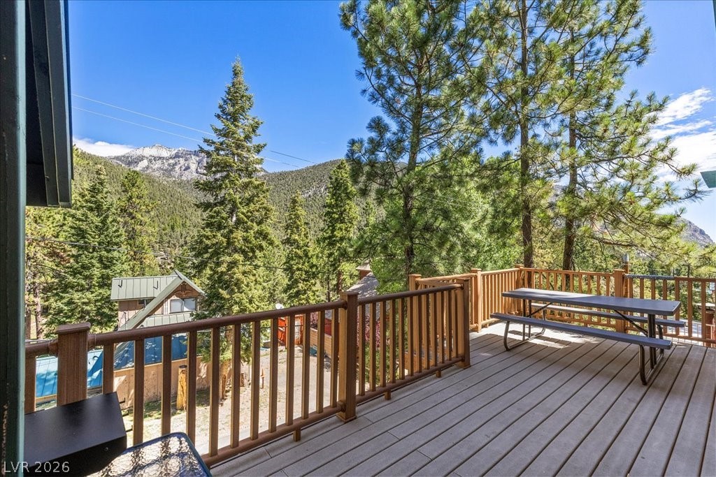 370 Alpine Way Mount Charleston, NV 89124 - Photo 8 of 79 Trex composite deck, ideal for relaxing or entertaining.