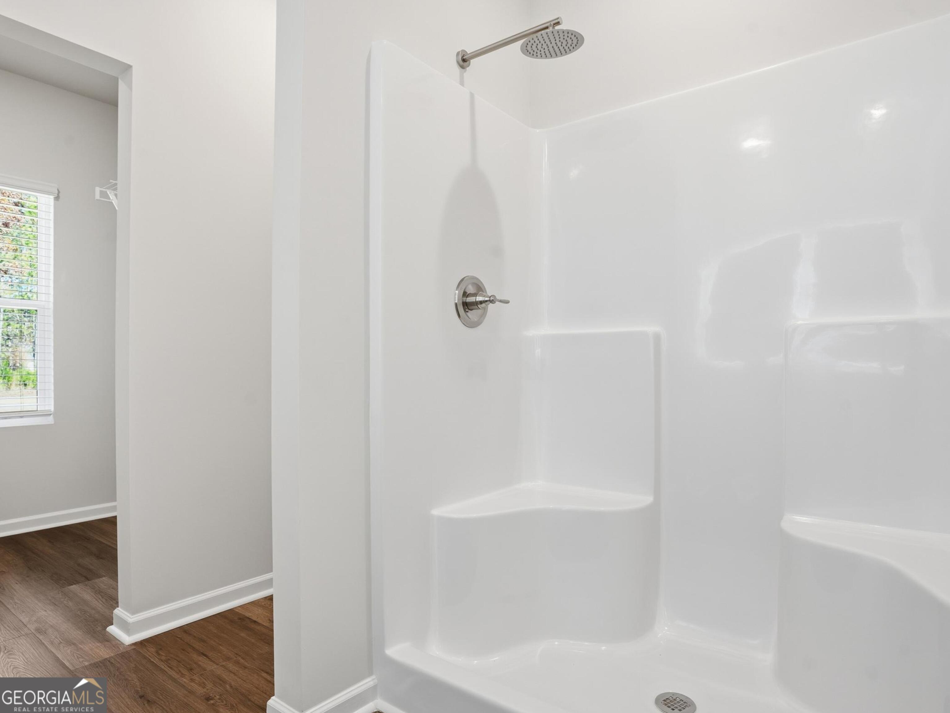 130 Post Oak Drive, Unit 130 Jackson, GA 30233 - Photo 11 of 29 a bathroom with a shower