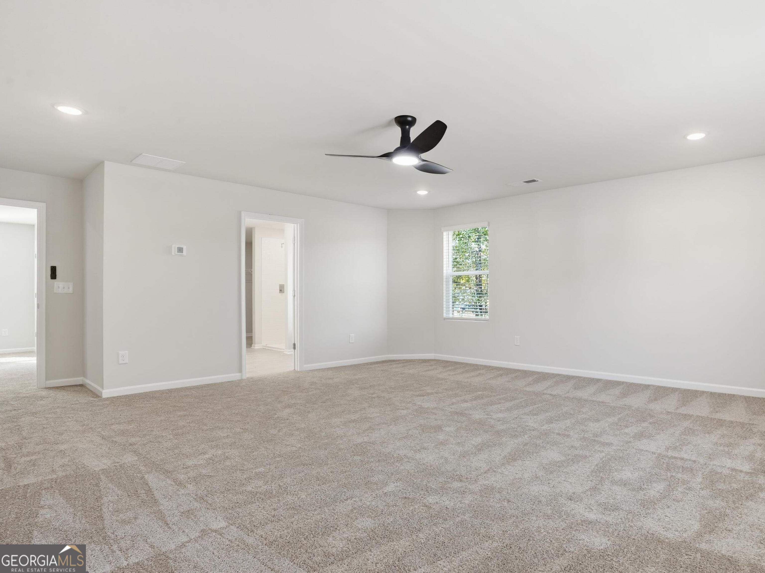 130 Post Oak Drive, Unit 130 Jackson, GA 30233 - Photo 17 of 29 a view of an empty room and a window