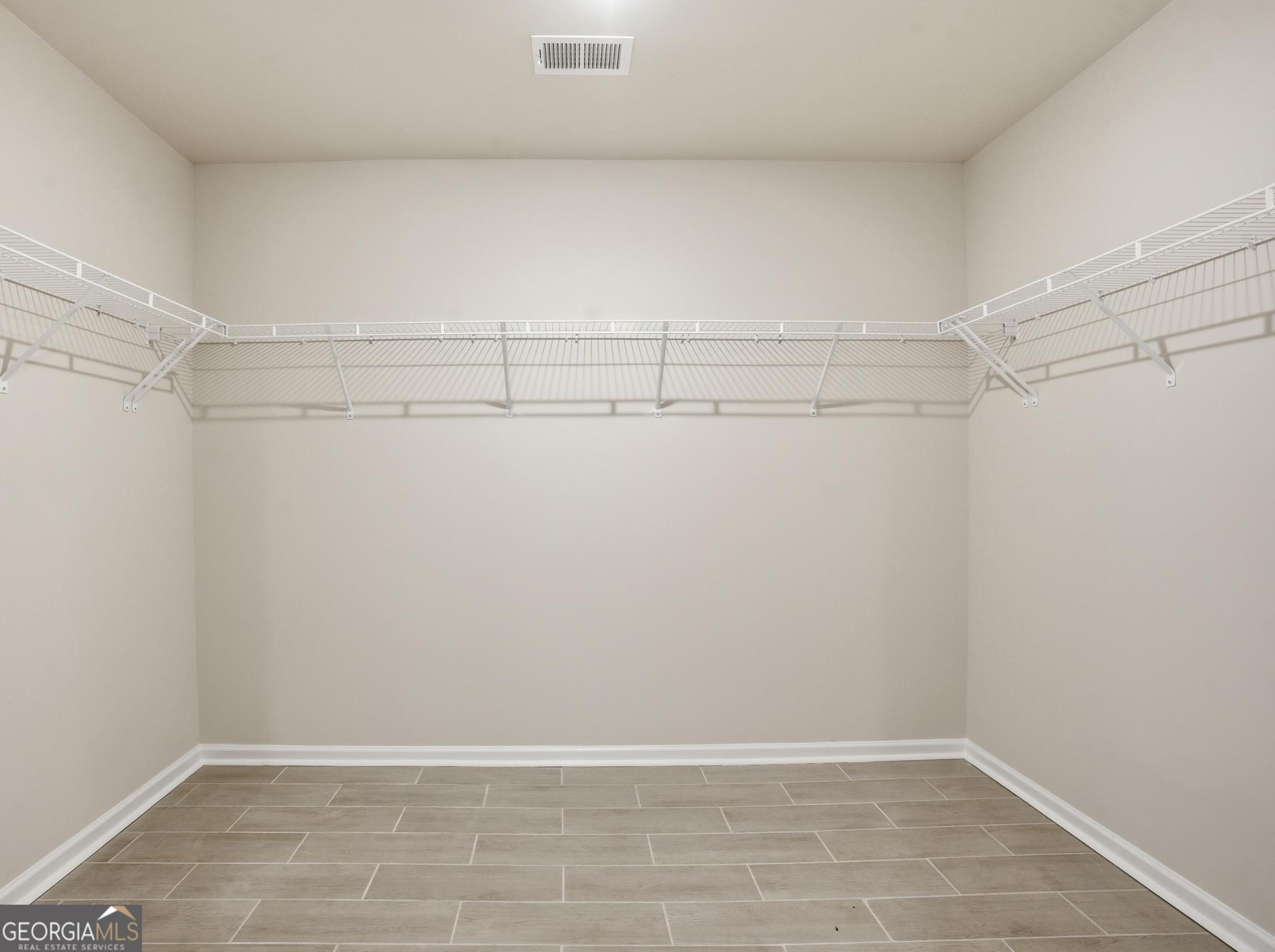 130 Post Oak Drive, Unit 130 Jackson, GA 30233 - Photo 20 of 29 a view of an empty walk in closet