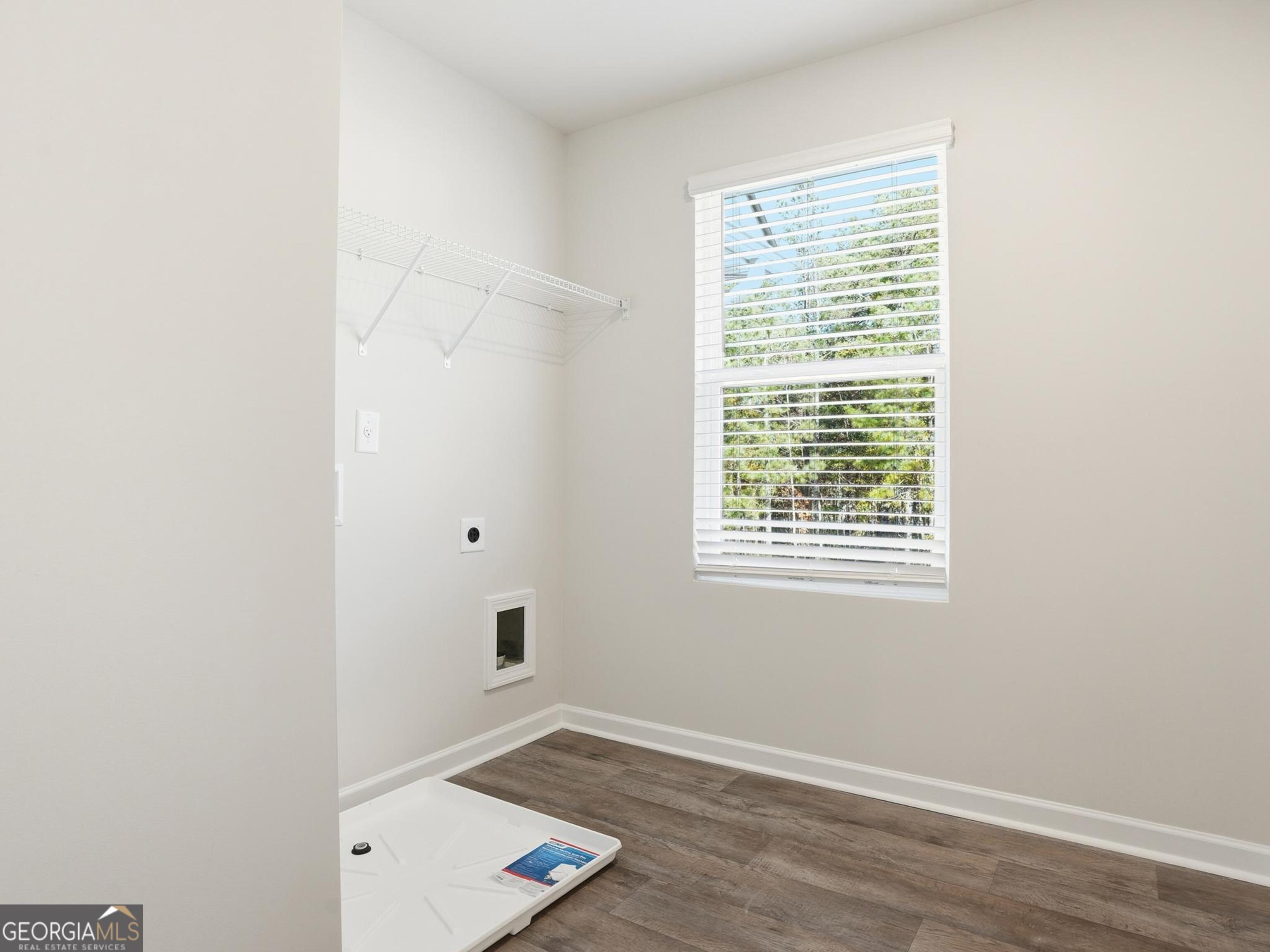 130 Post Oak Drive, Unit 130 Jackson, GA 30233 - Photo 27 of 29 a view of an empty room with a window